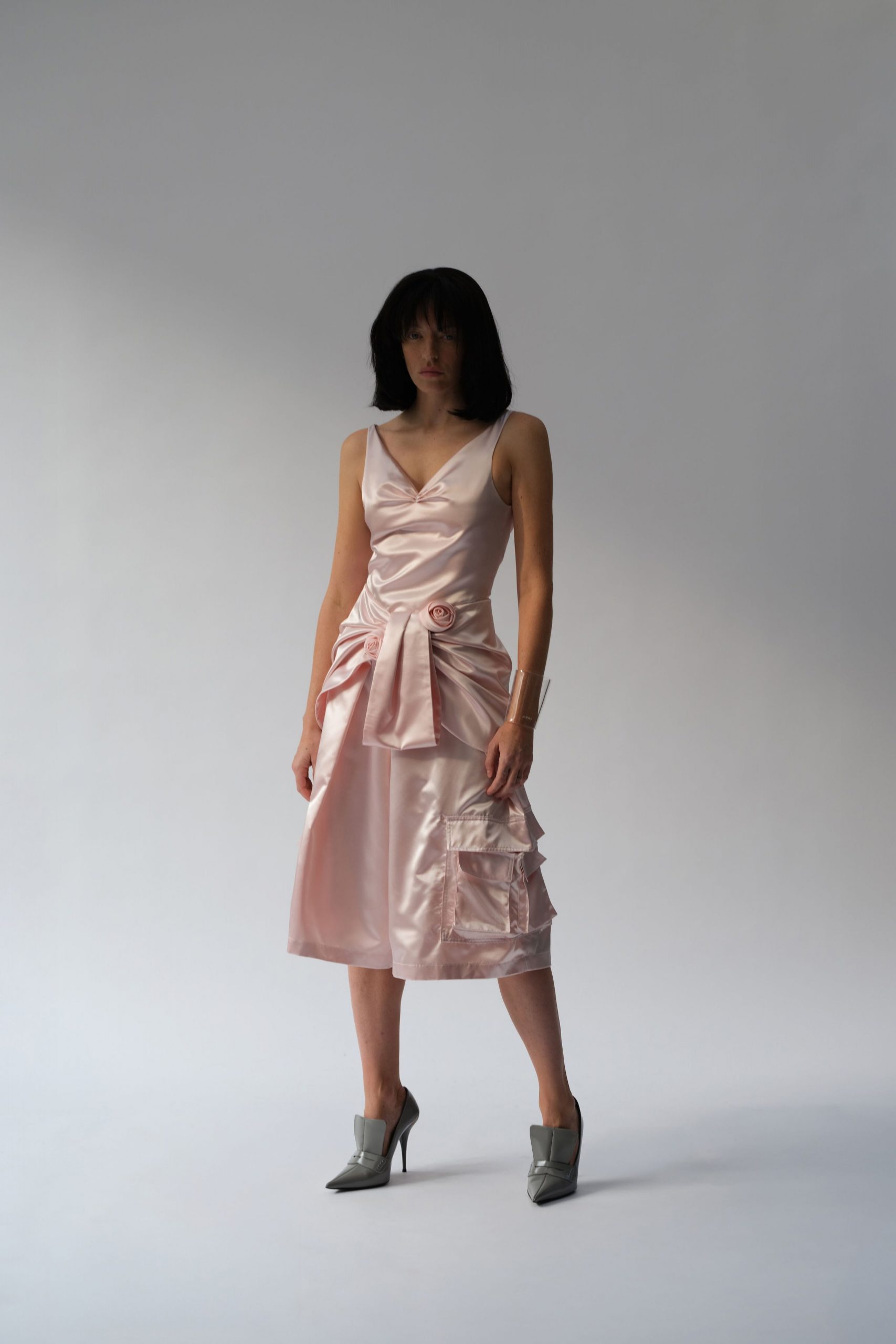 pink satin sleeveless v-neck fitted draped tiered dress