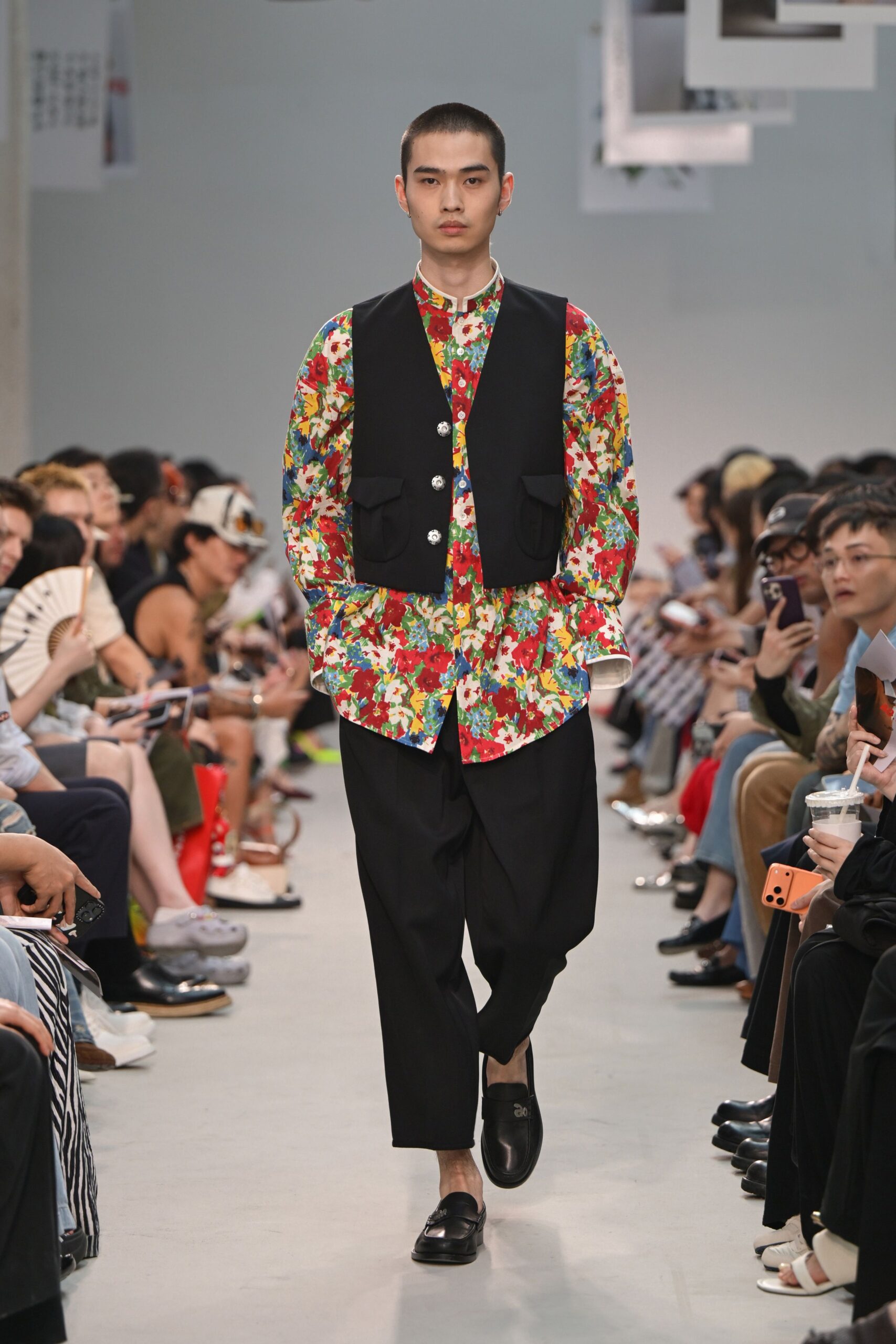 black vest floral shirt wide-leg pants