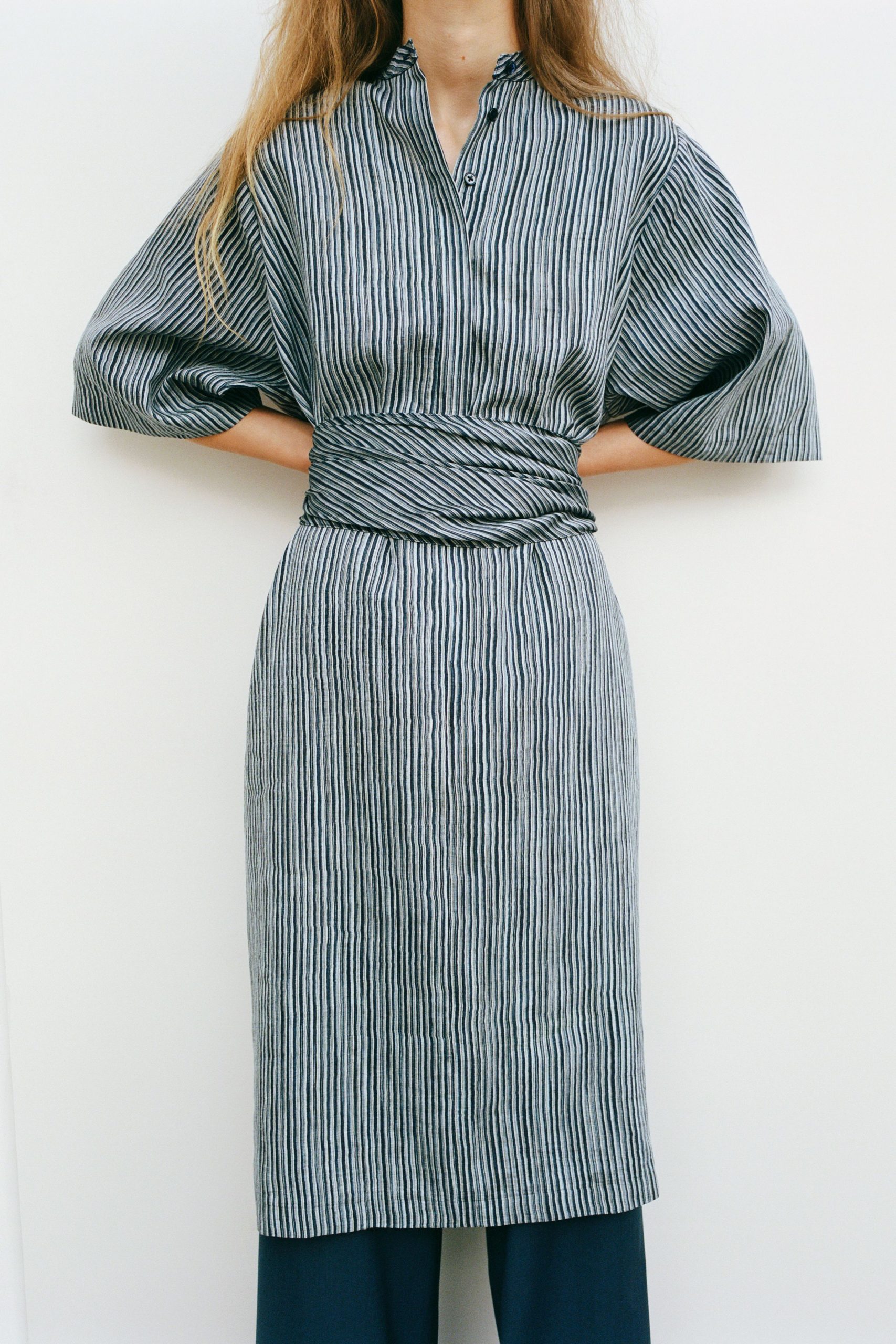 striped blue and white midi dress with relaxed pants