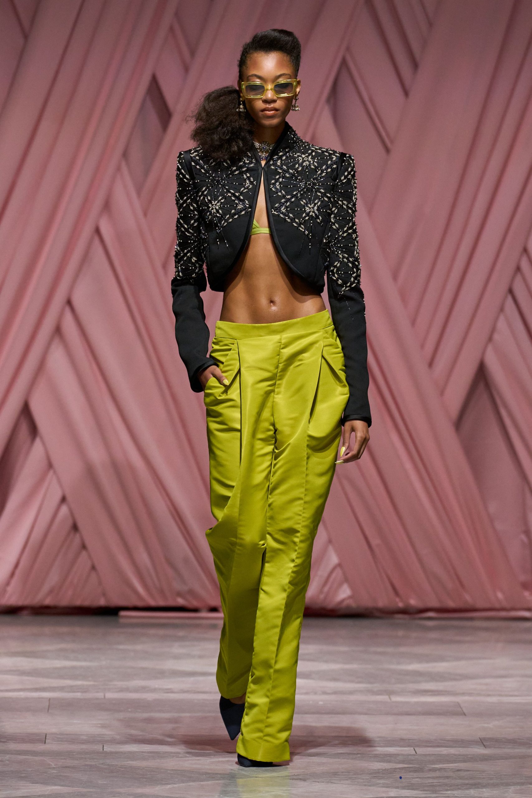 black embroidered jacket green top