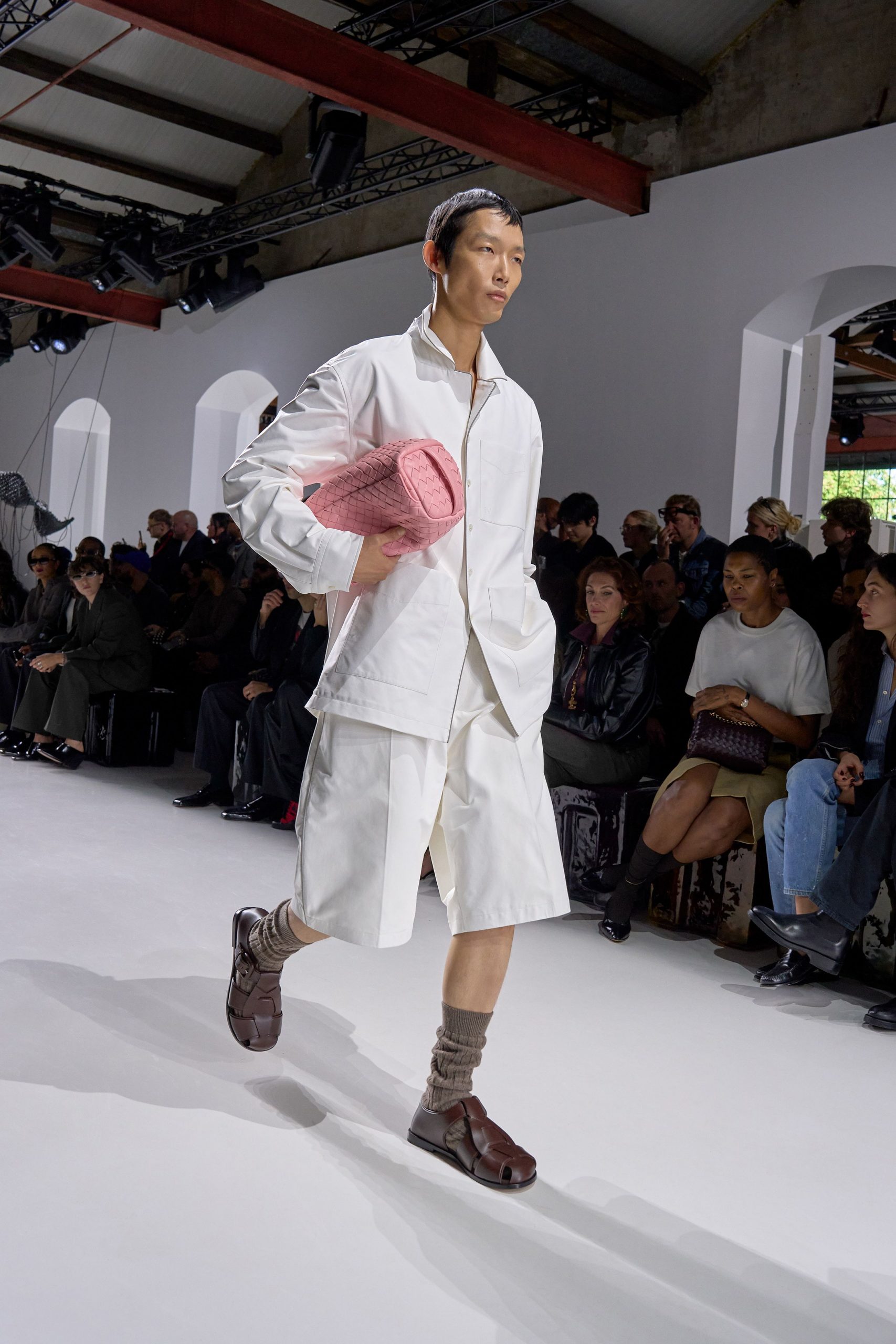 white shirt and shorts with brown shoes