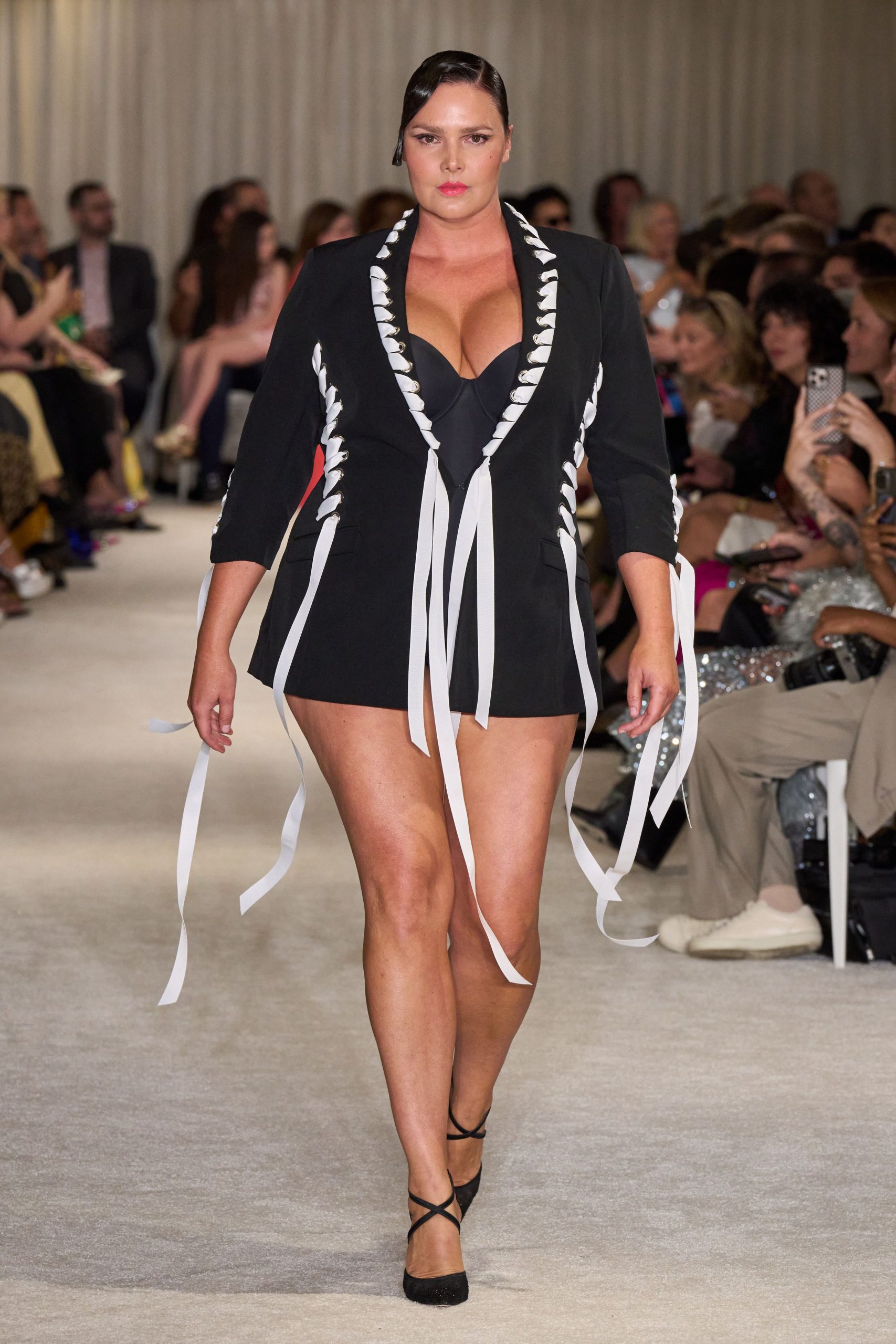 black fitted mini dress with long sleeves