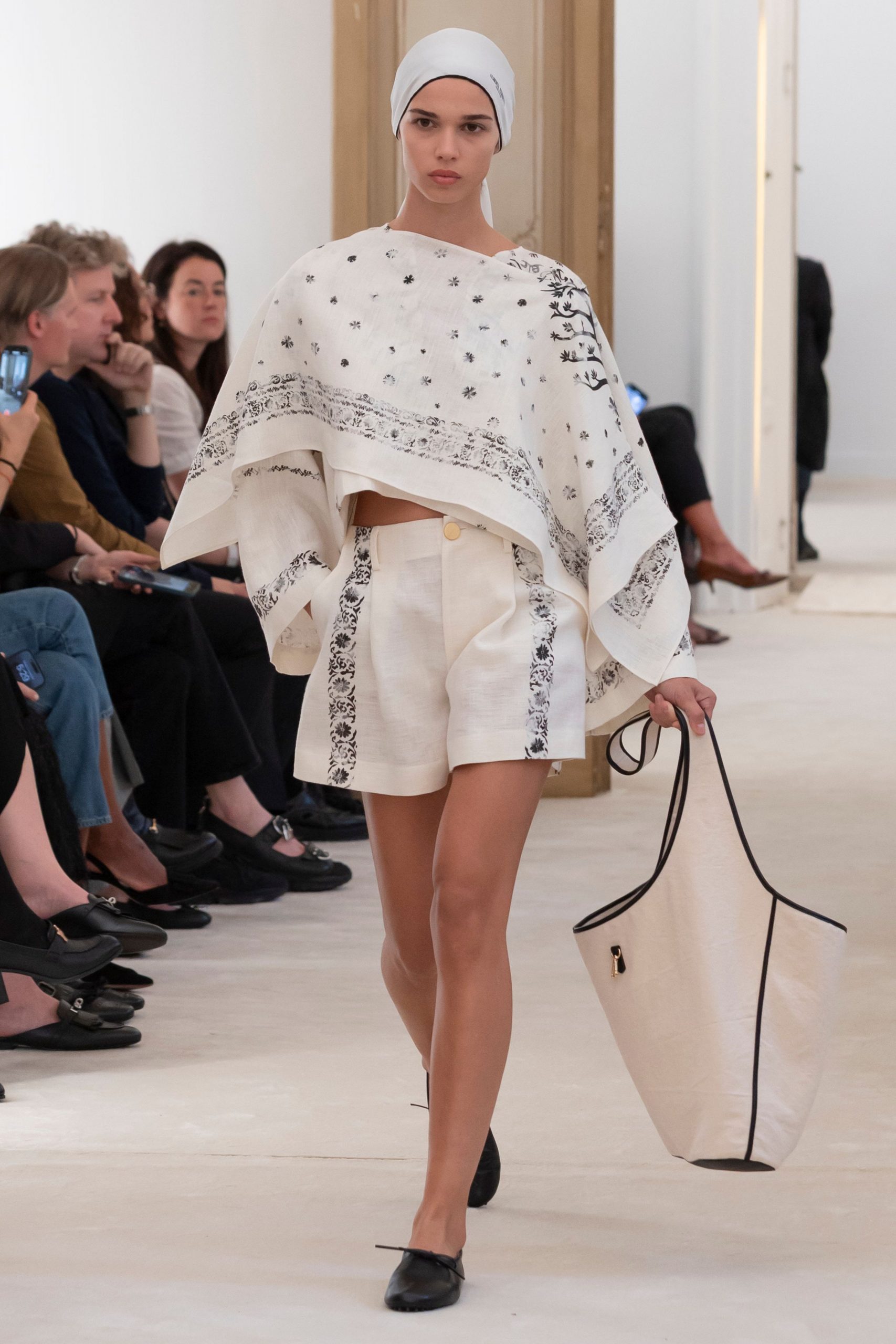 white embroidered poncho with shorts