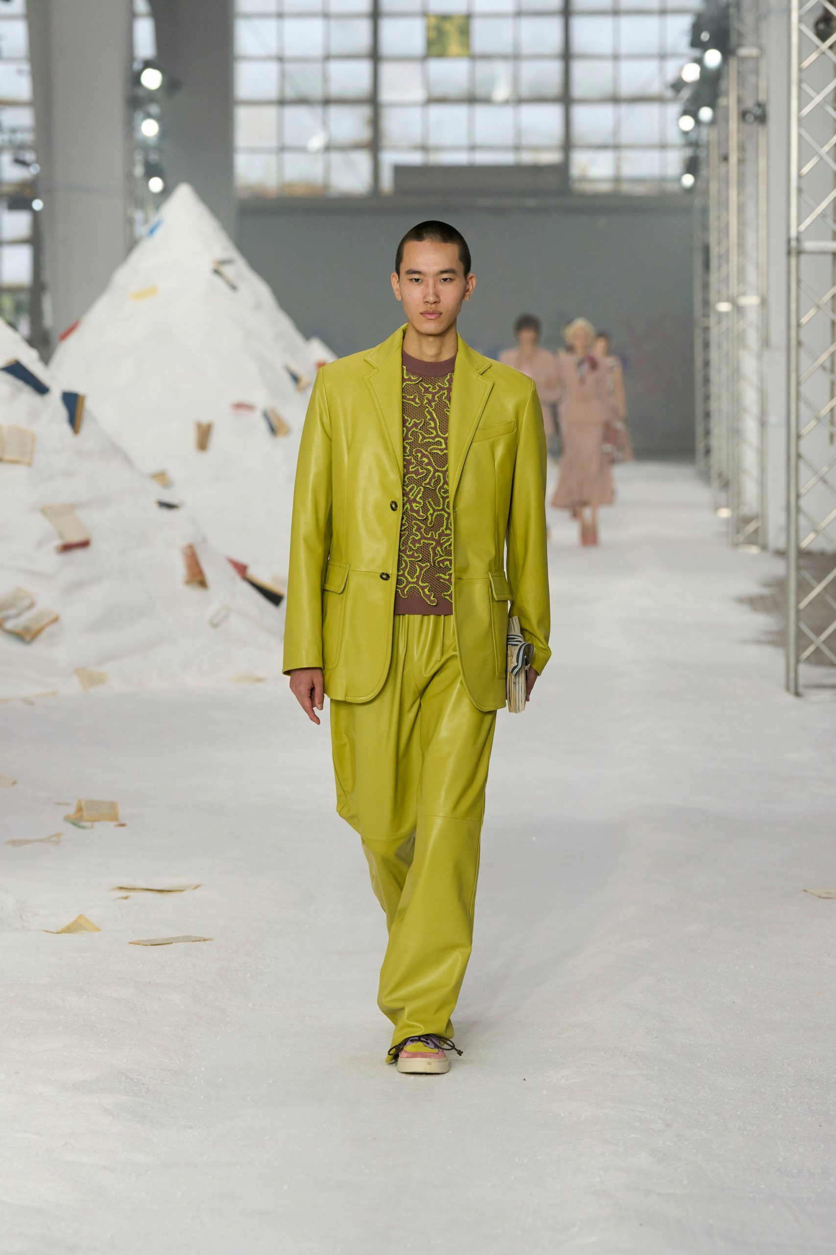 green leather suit with printed top