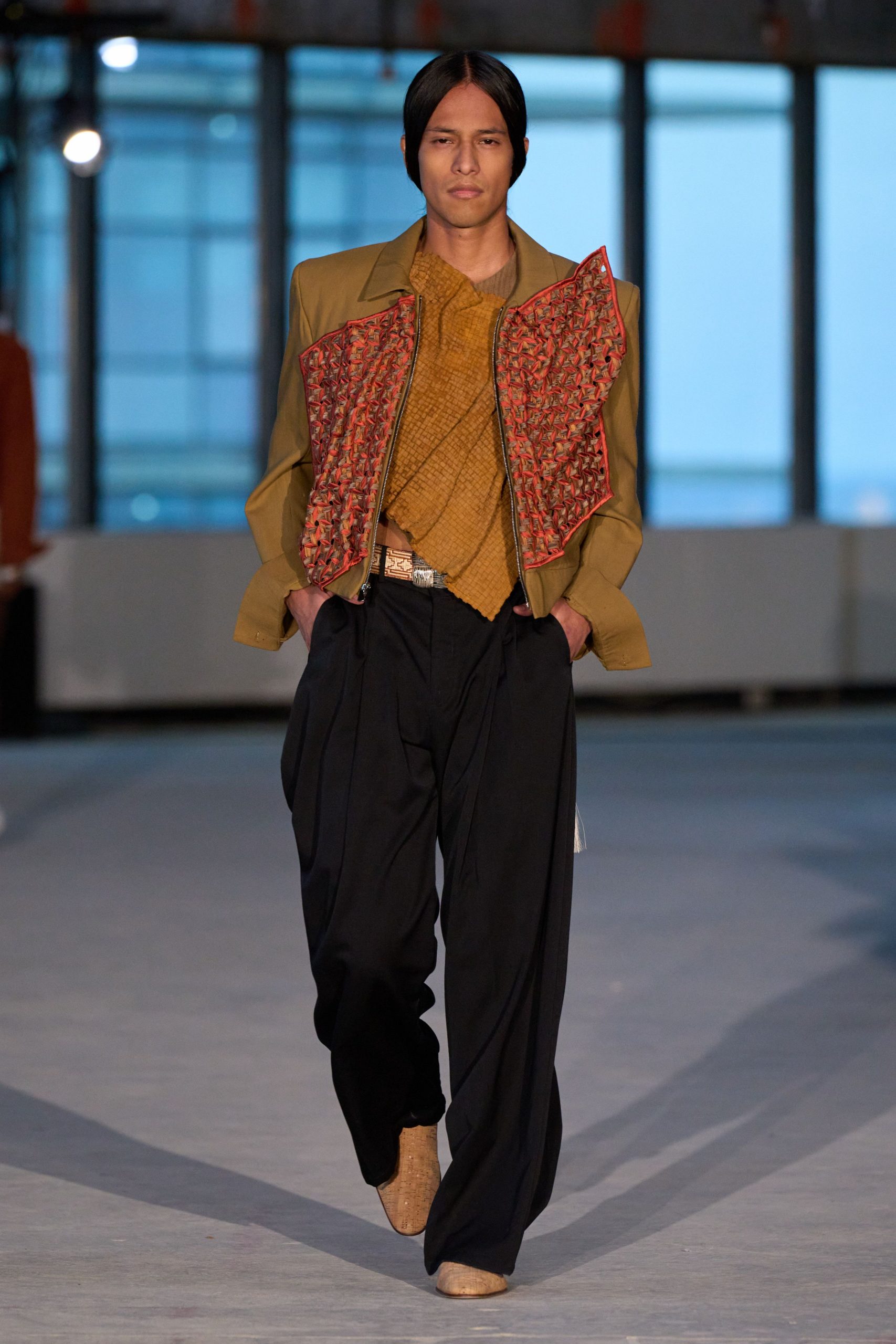 beige jacket with red detail