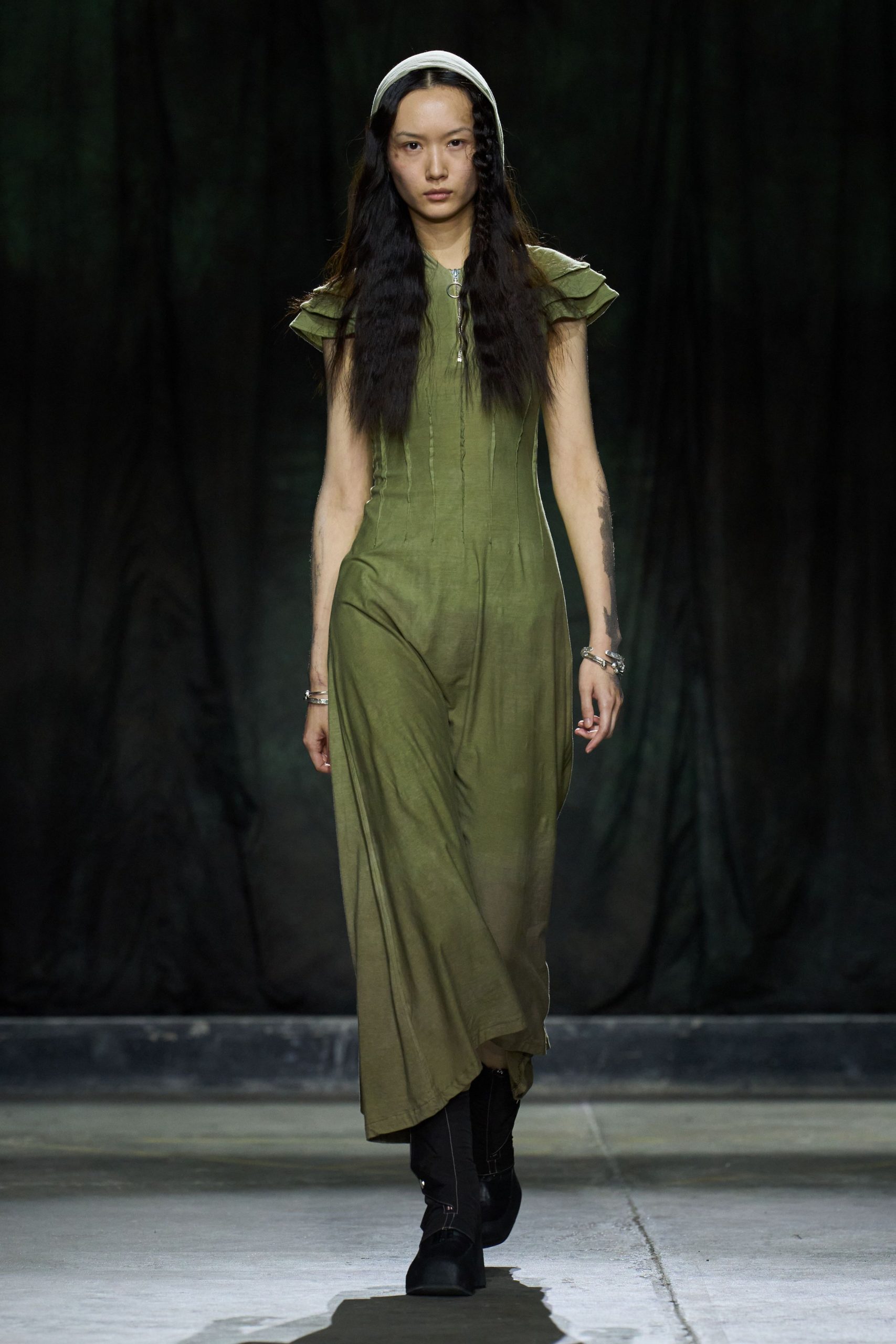green fitted maxi dress with boots