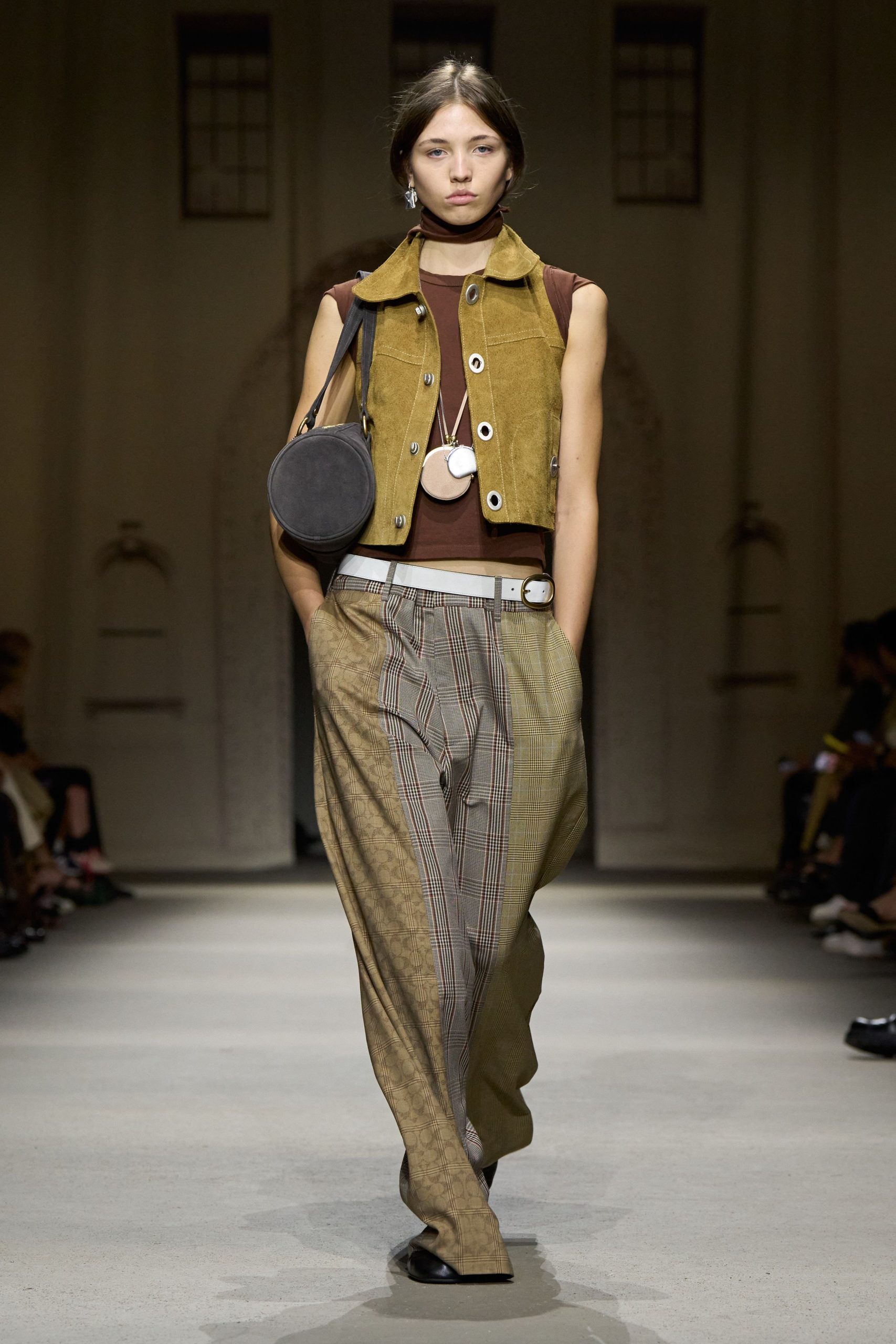 brown fitted vest and pants
