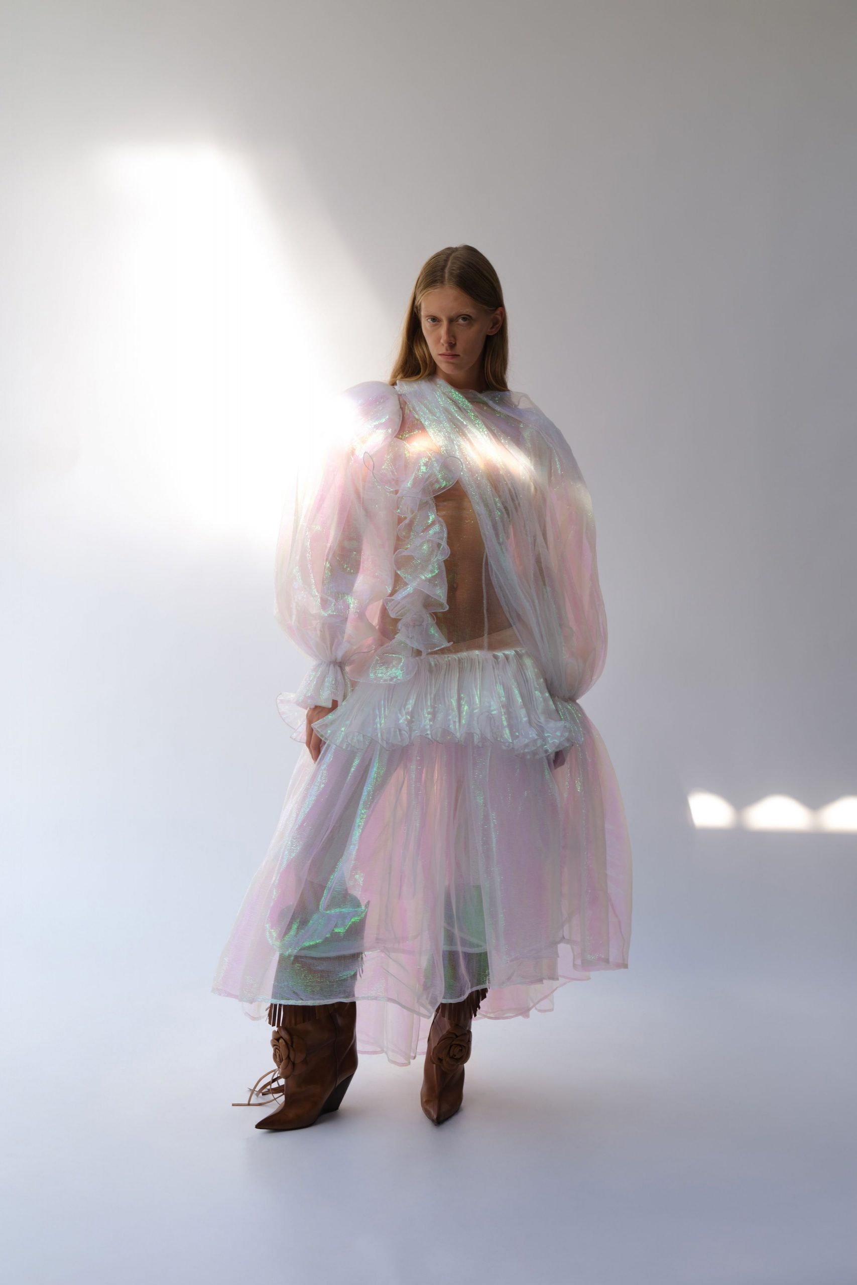 pink multi-layered ruffled dress with brown boots