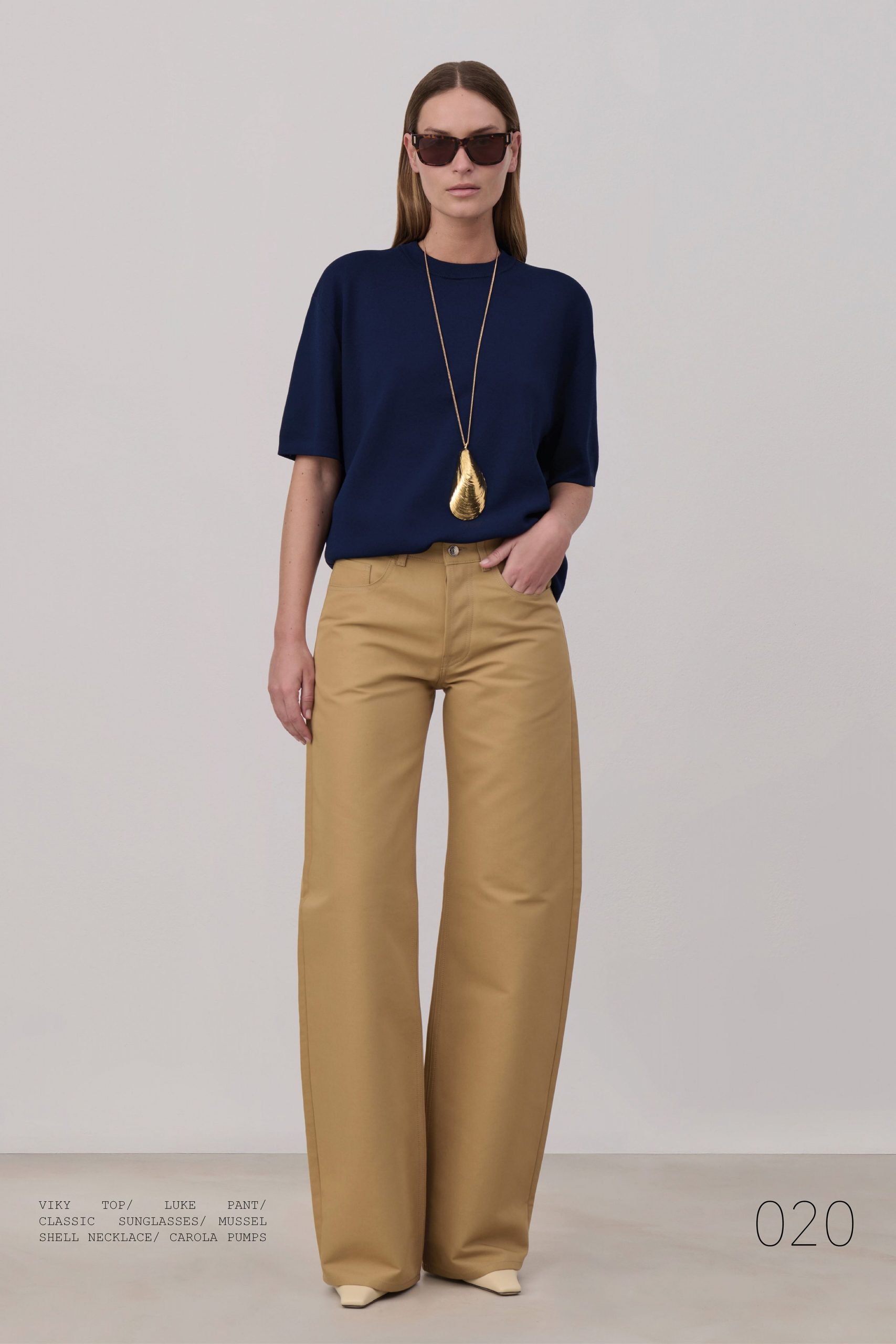 blue relaxed top beige wide-leg pants