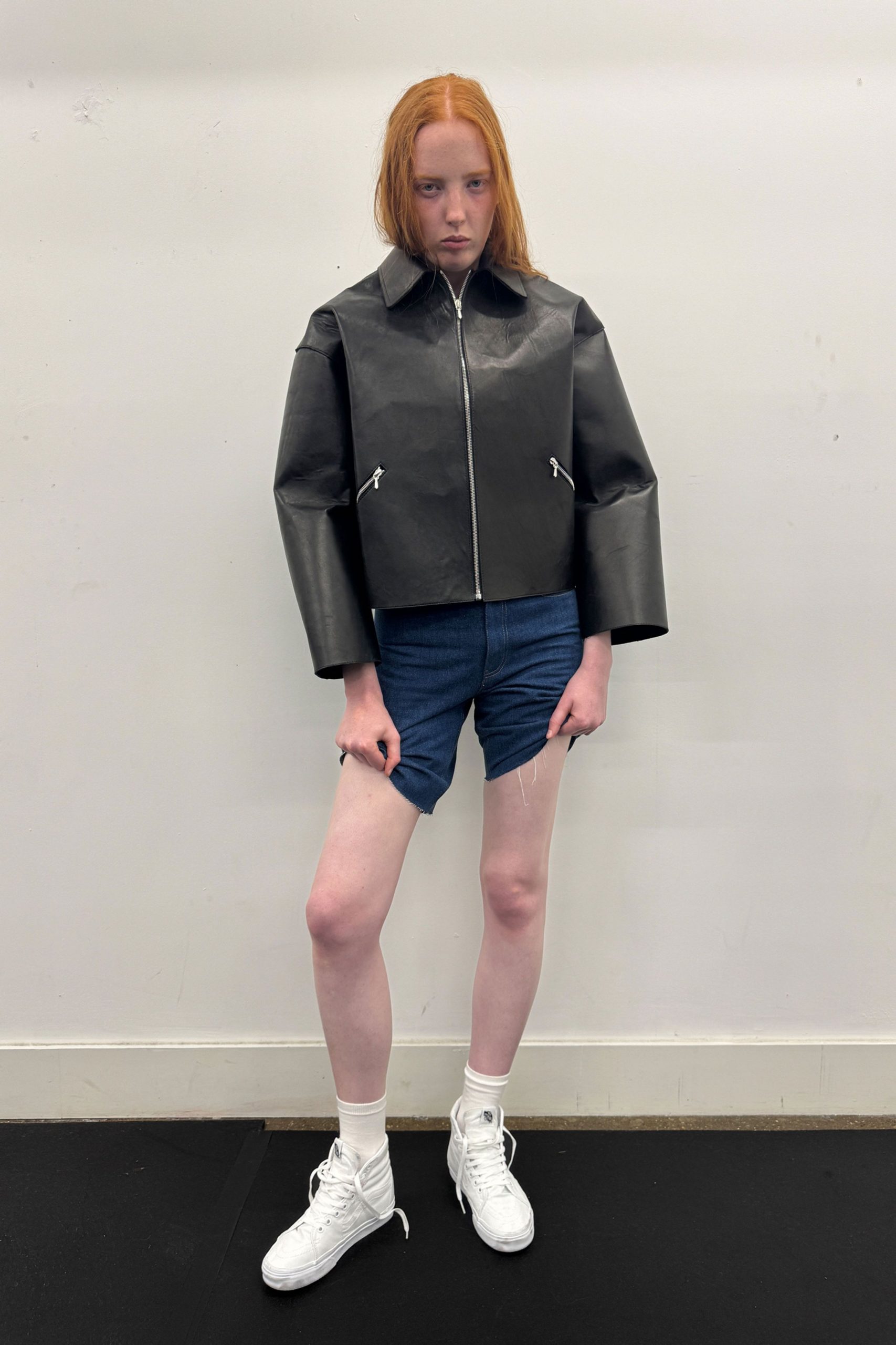 black vinyl long-sleeve collared structured jacket