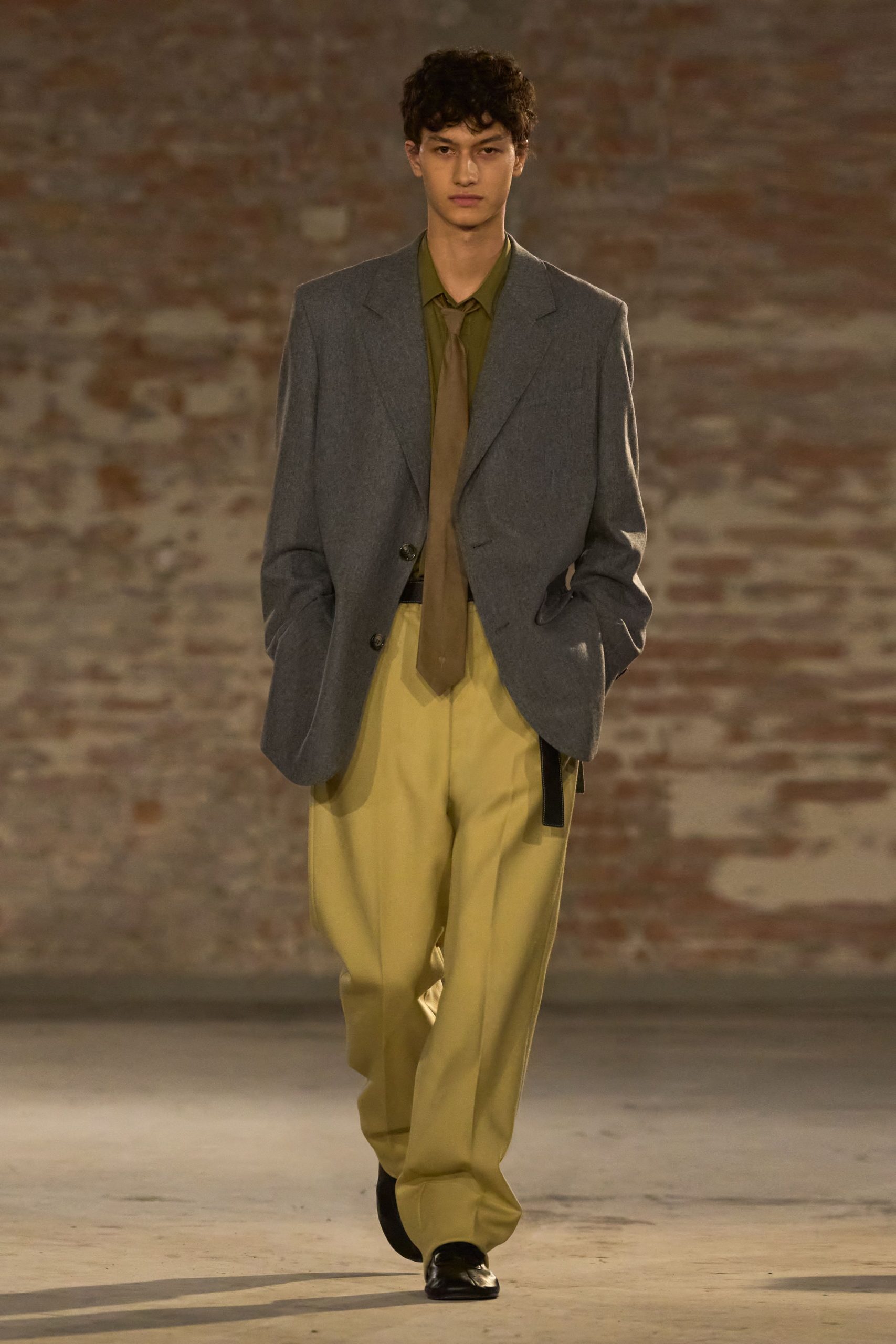 gray blazer green shirt yellow pants