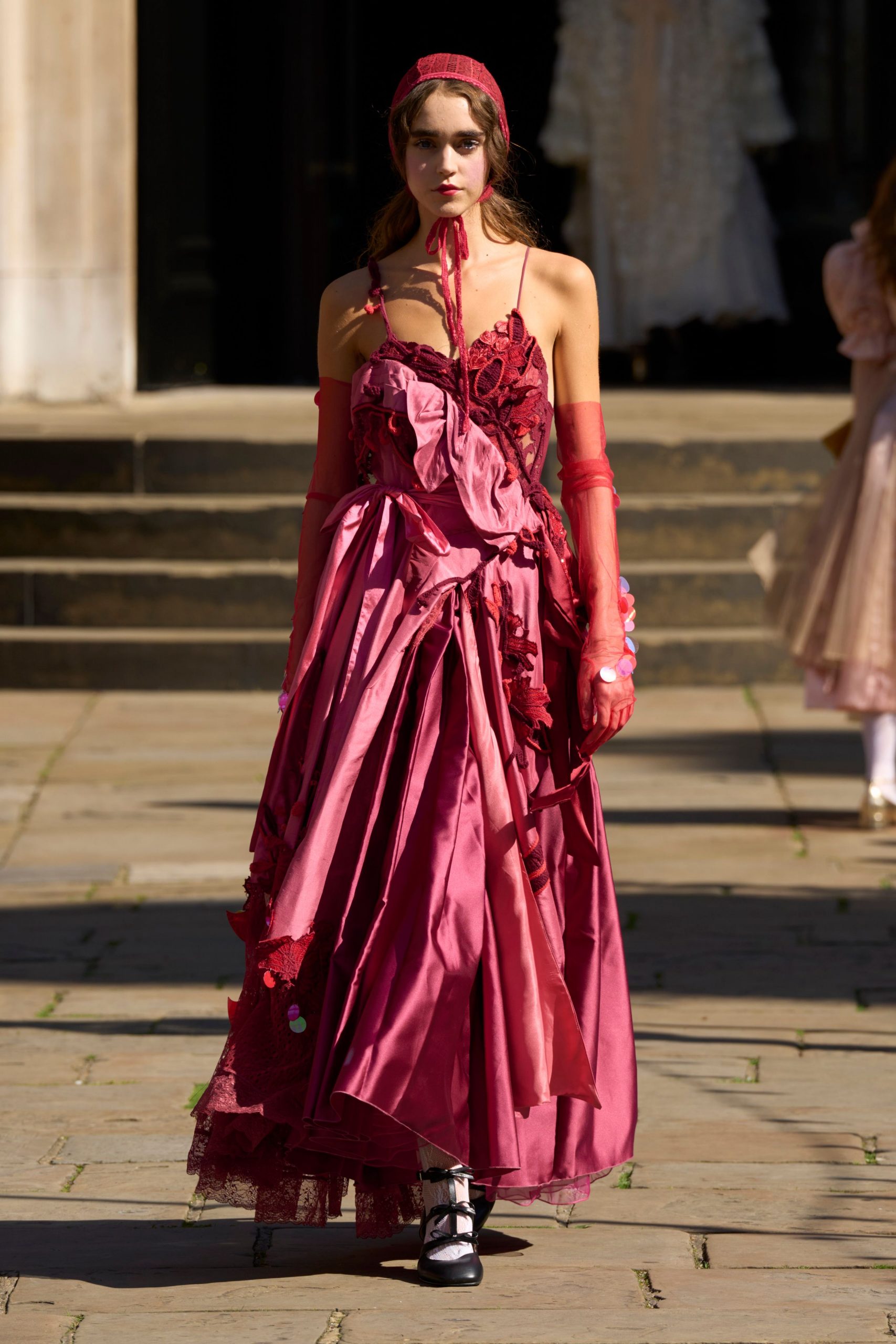 red silk sleeveless v-neck fitted ruffled layered gown