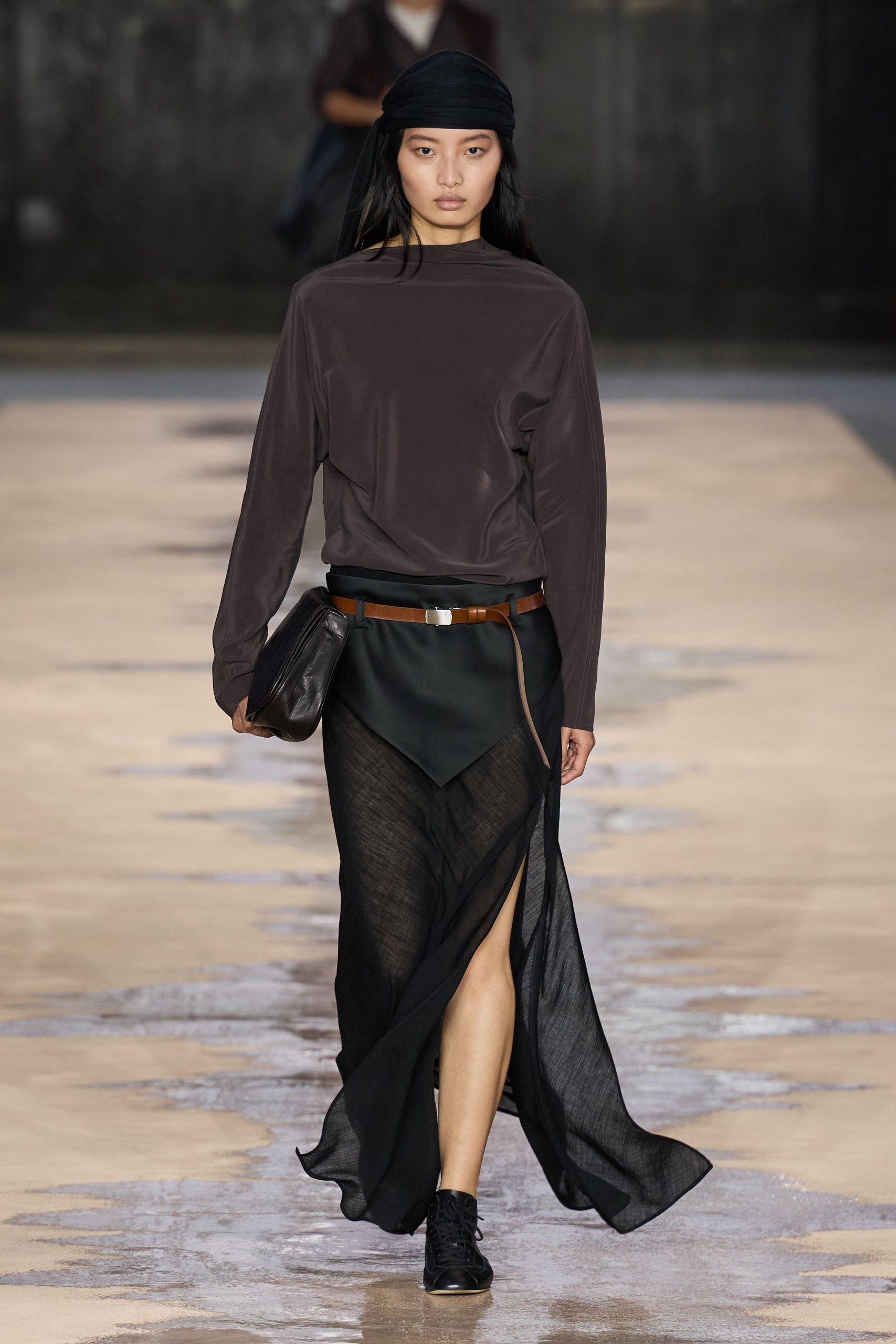 black fitted top and flowing skirt