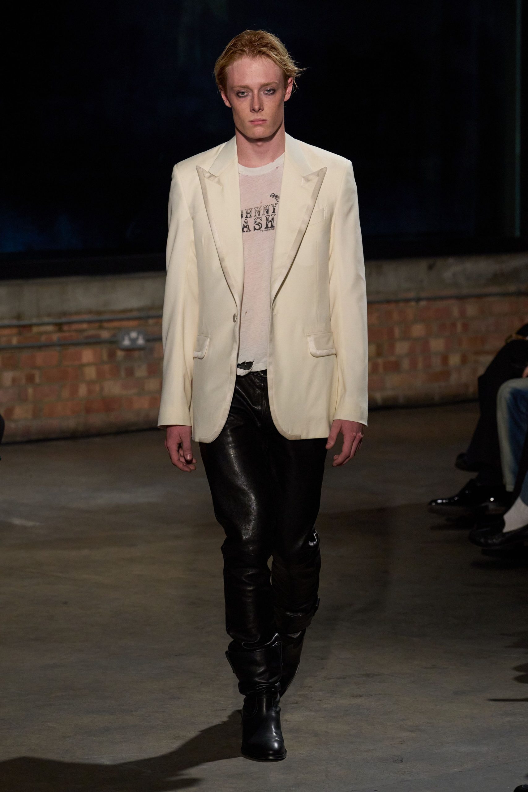 white tailored blazer with black pants
