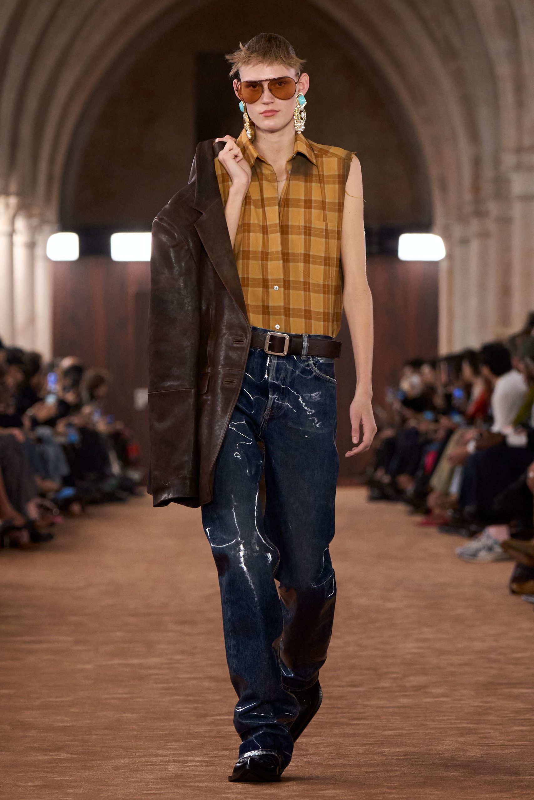 checked sleeveless shirt with denim pants