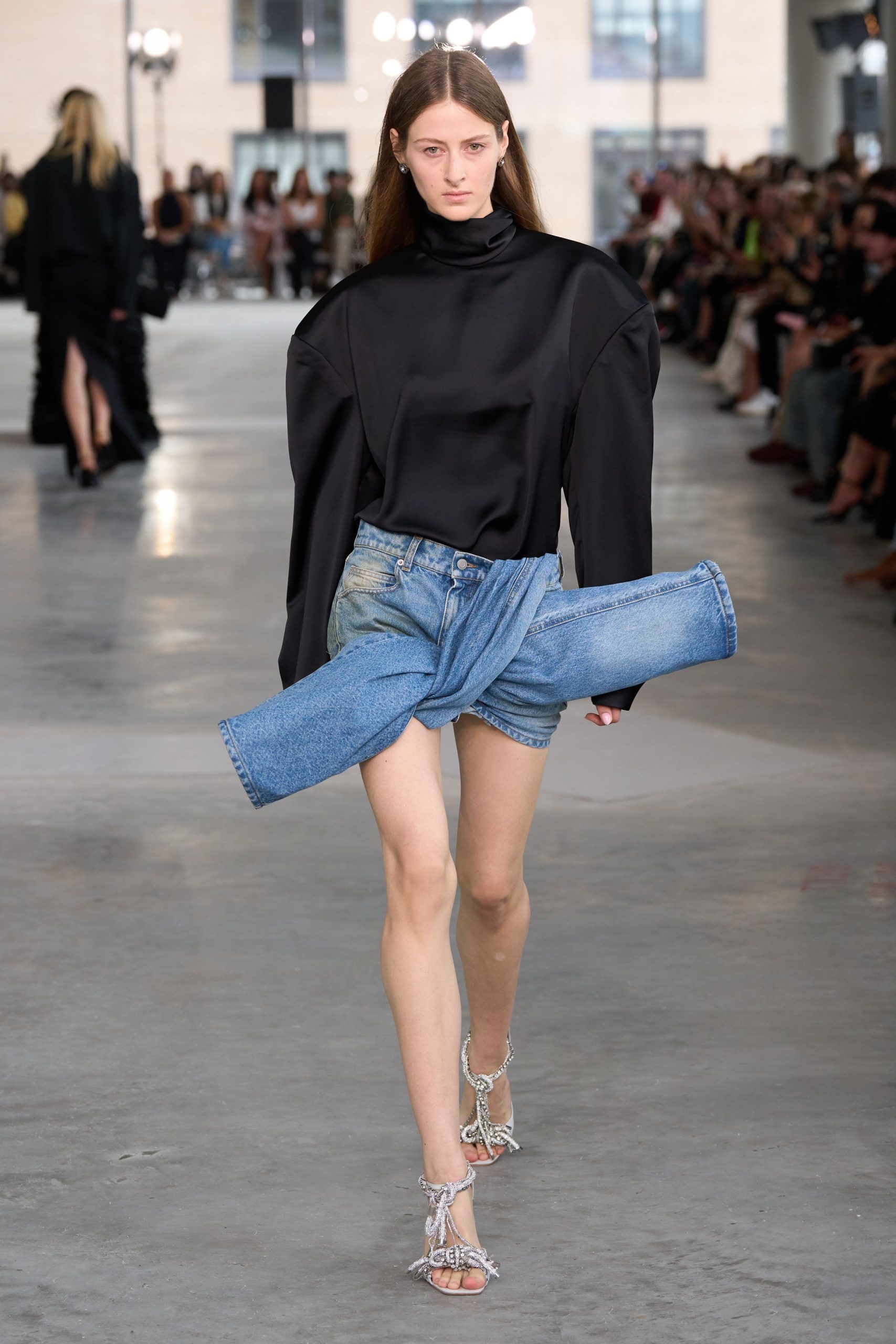 black silk relaxed top with denim shorts