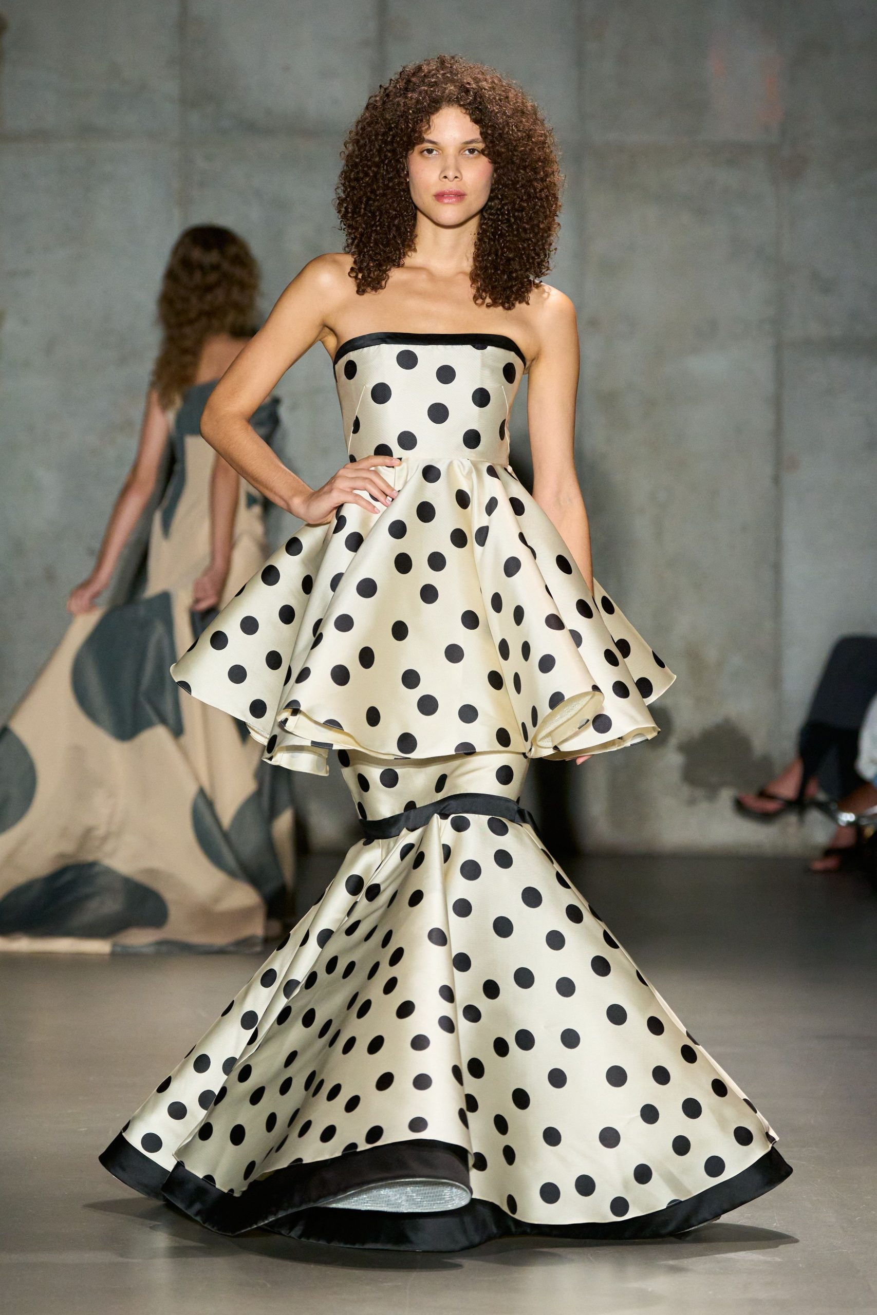 beige and black polka-dot gown