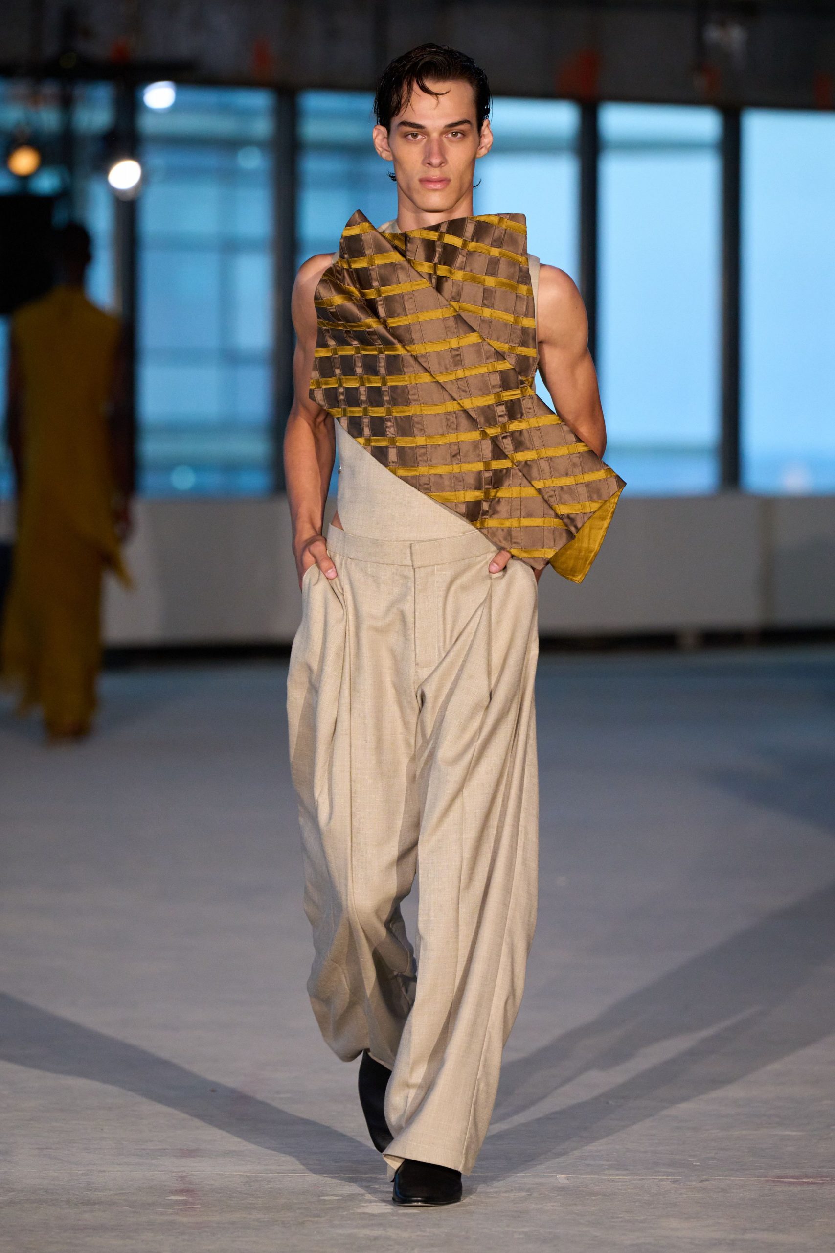 beige relaxed pants with gold top
