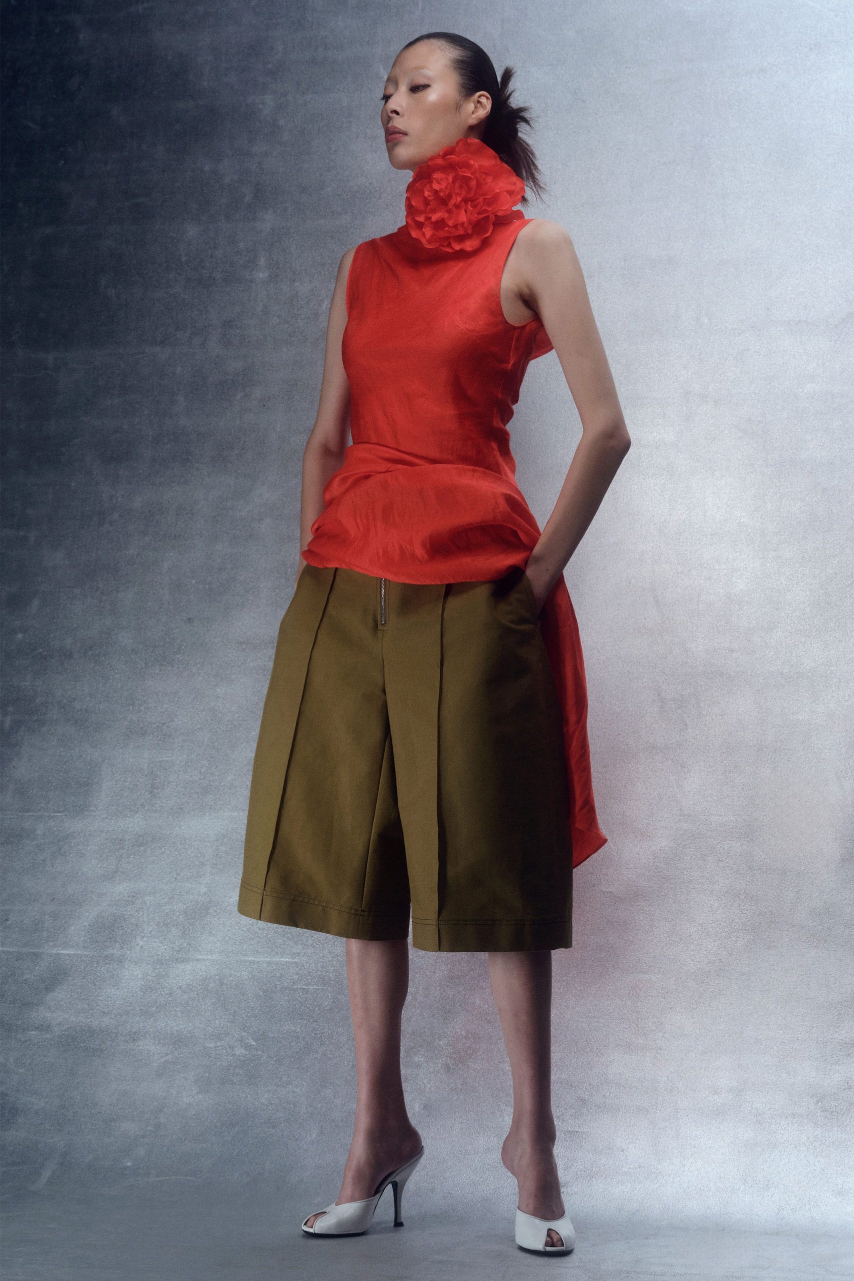 red cotton sleeveless high-neck fitted ruffled top