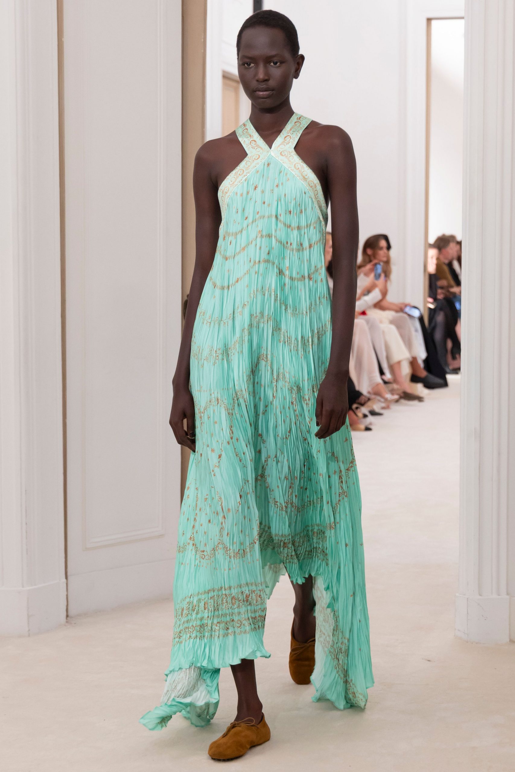 green silk sleeveless halter relaxed pleated embroidered gown