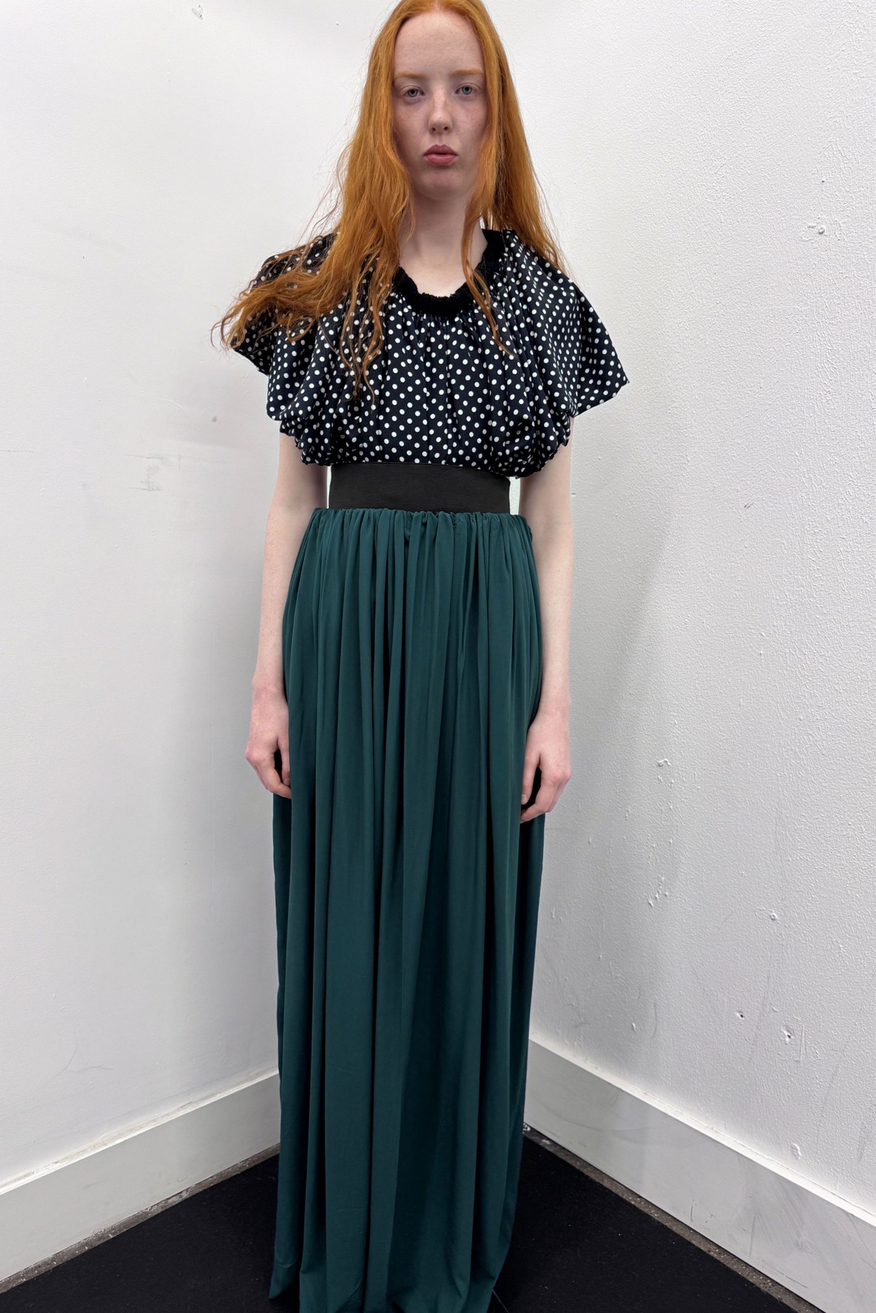 green fitted pleated maxi skirt