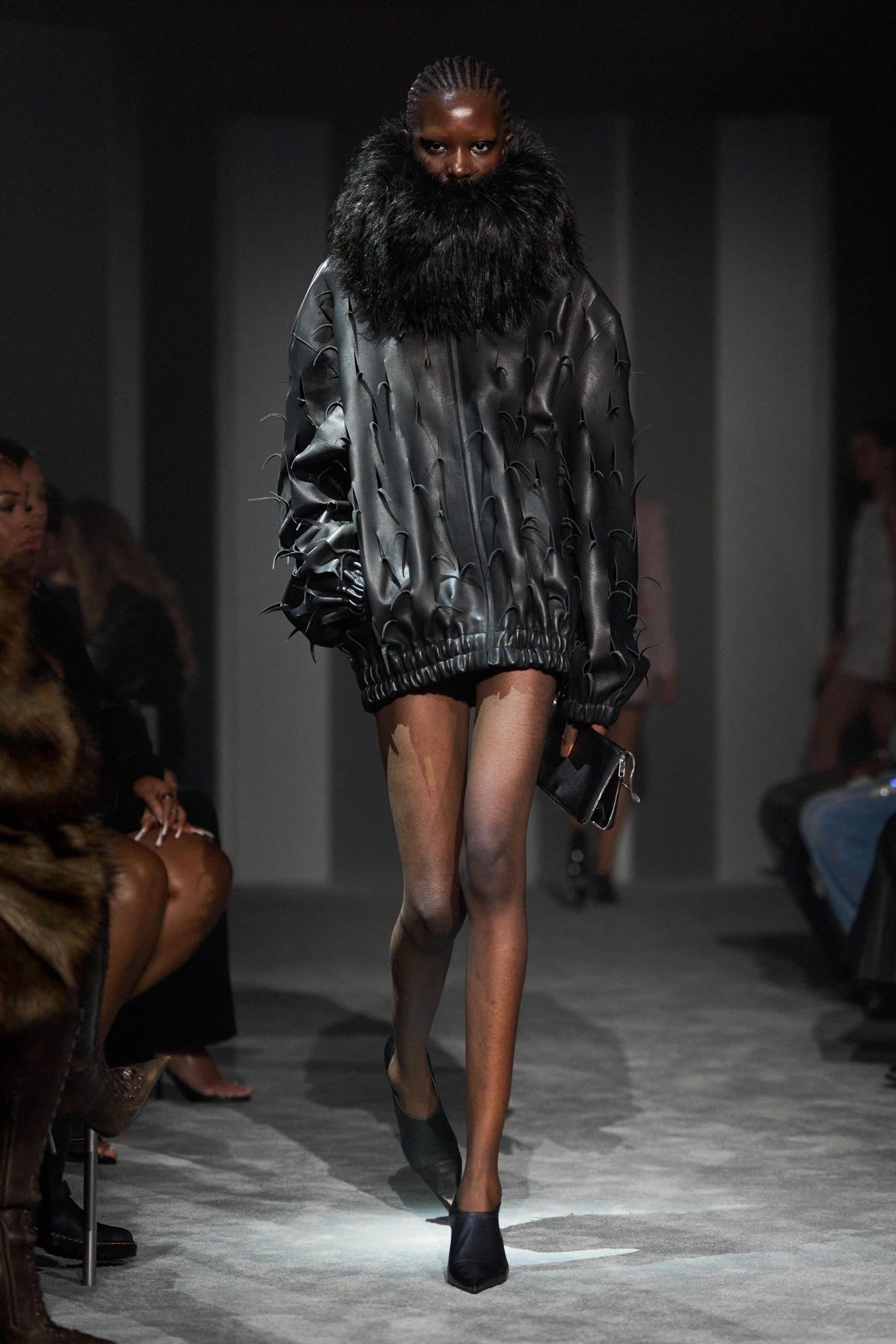 black leather long-sleeve collared oversized ruffled jacket