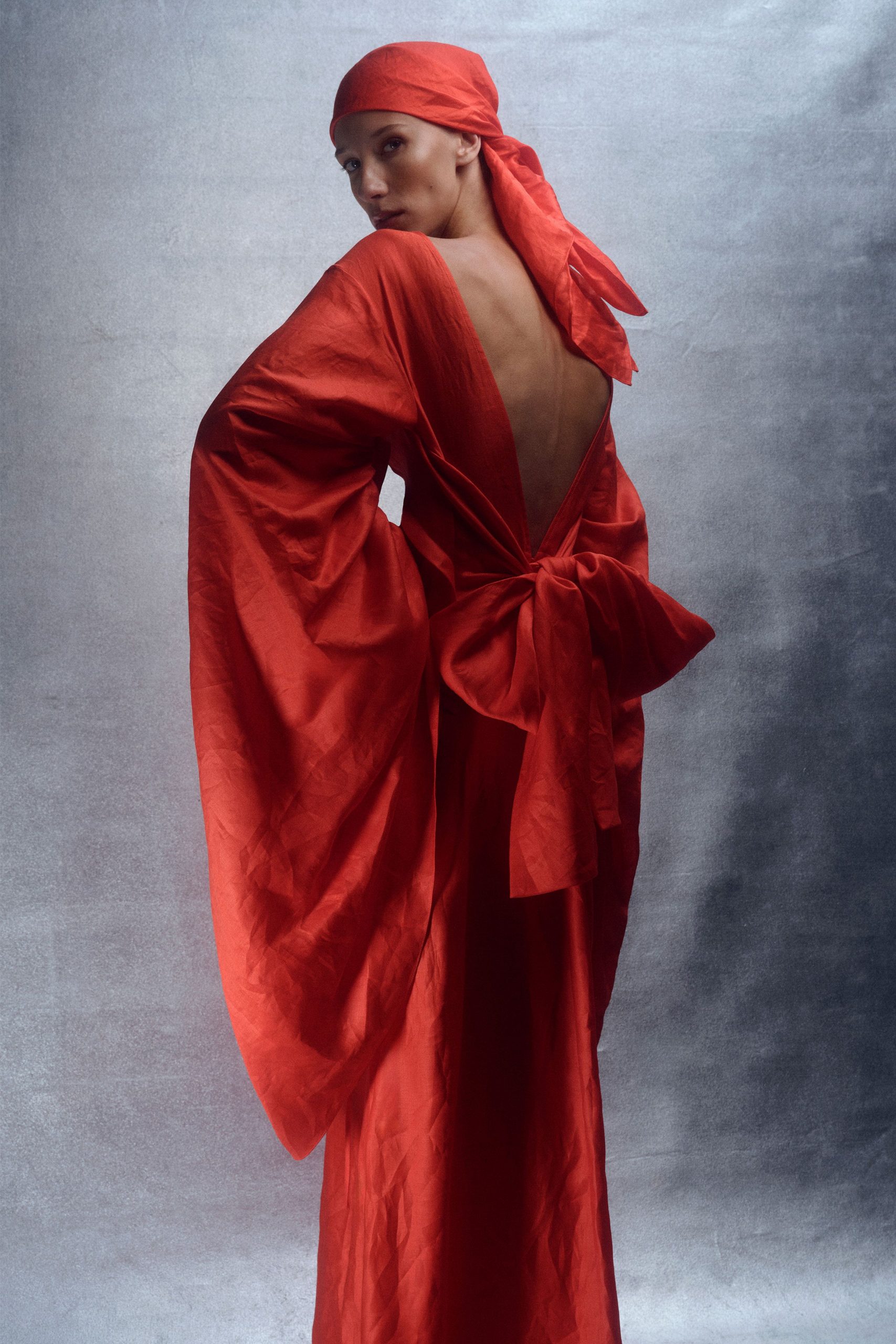 red silk backless gown