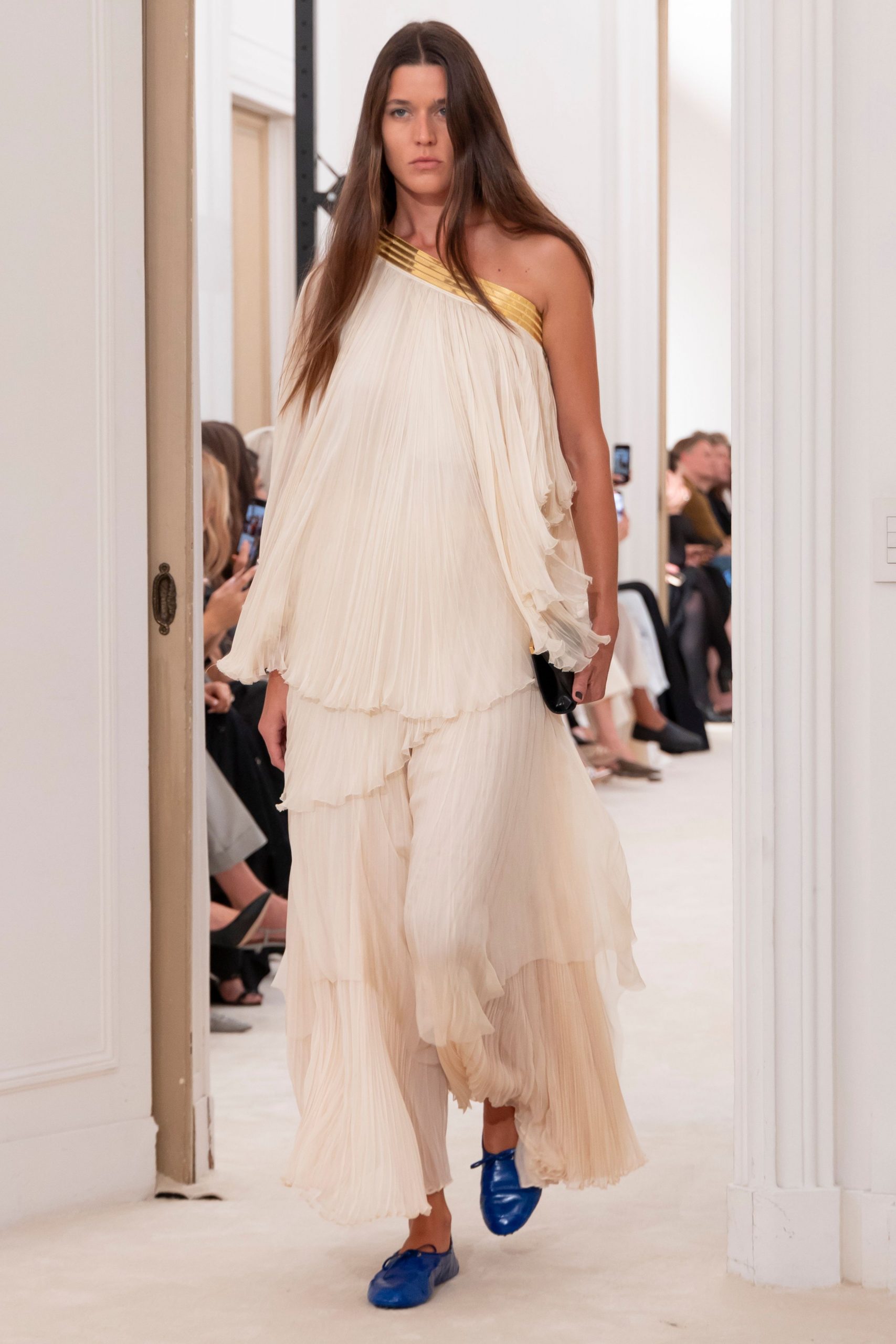 ivory pleated maxi dress with blue shoes