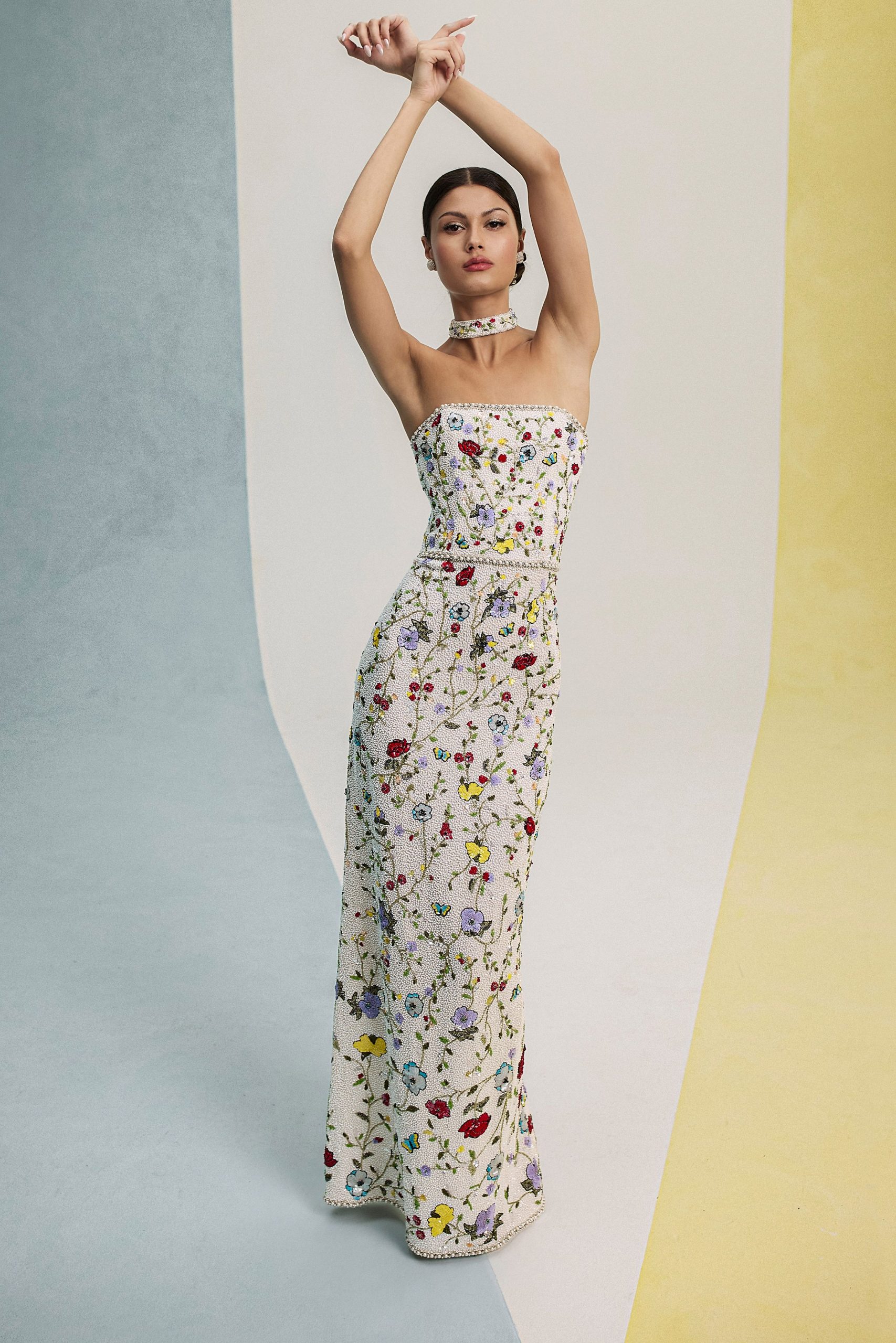 white embroidered strapless gown