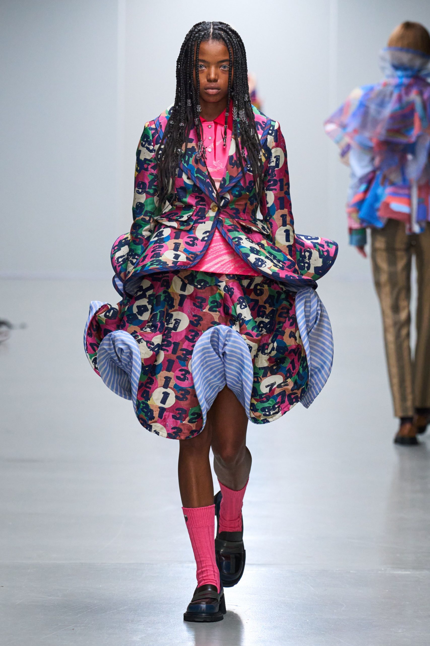 multi-colored blazer and skirt