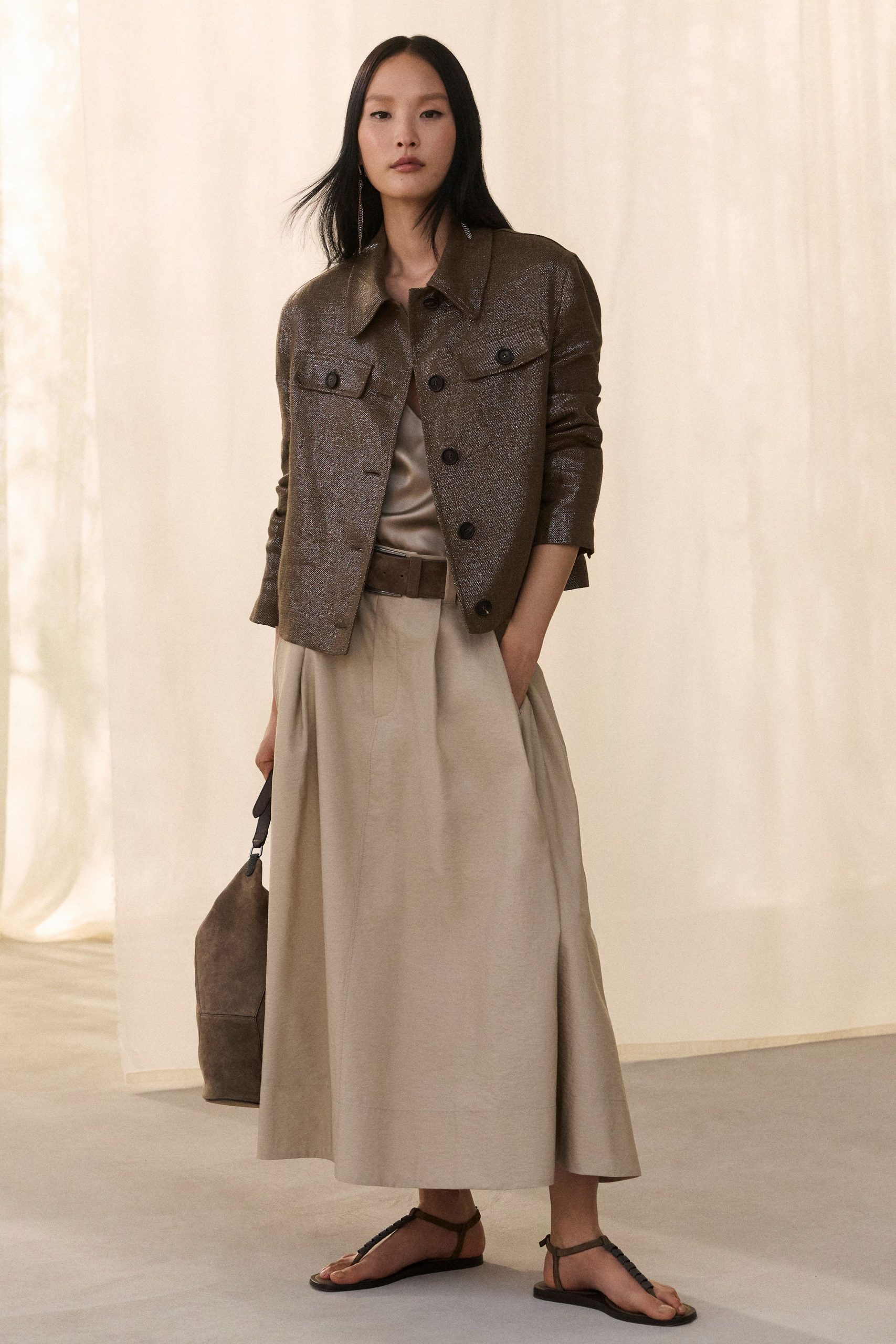 brown leather jacket beige skirt