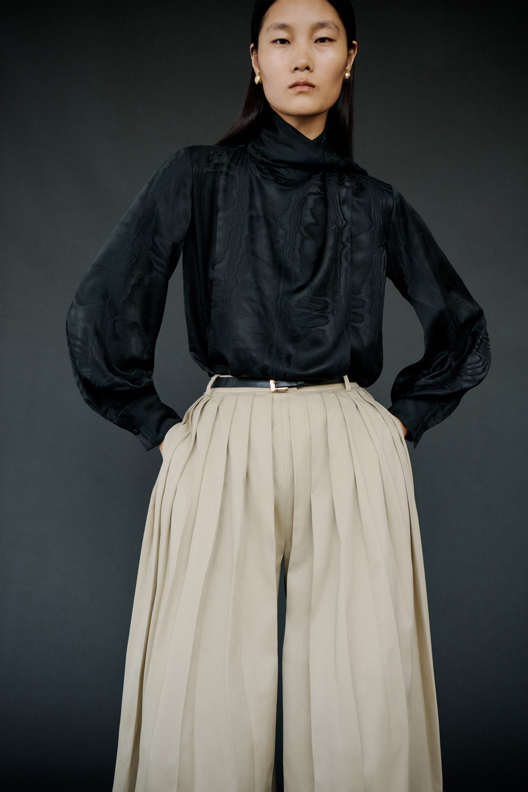 black silk long-sleeve high-neck fitted pleated blouse