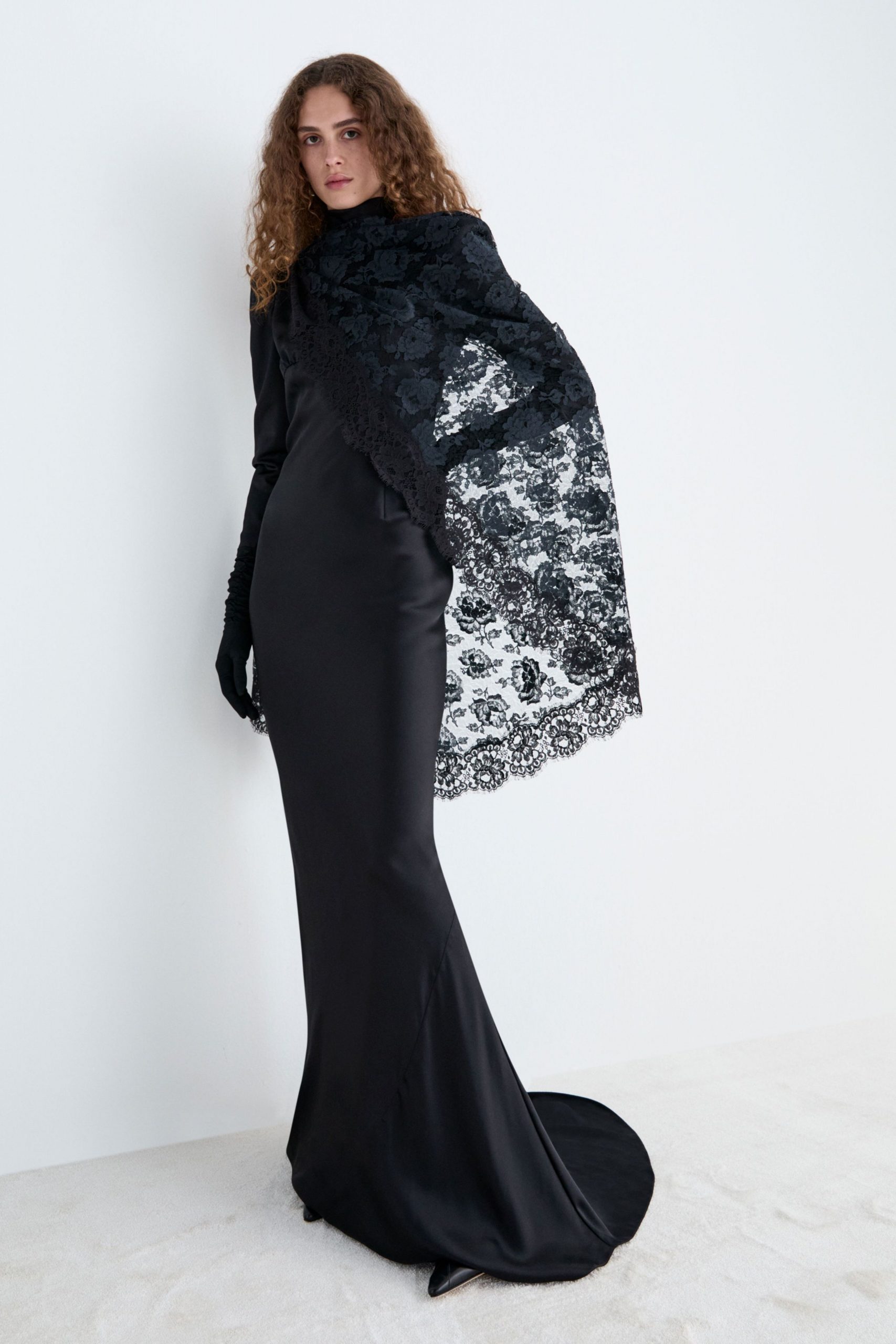 black silk long-sleeve high-neck fitted layered embellished gown