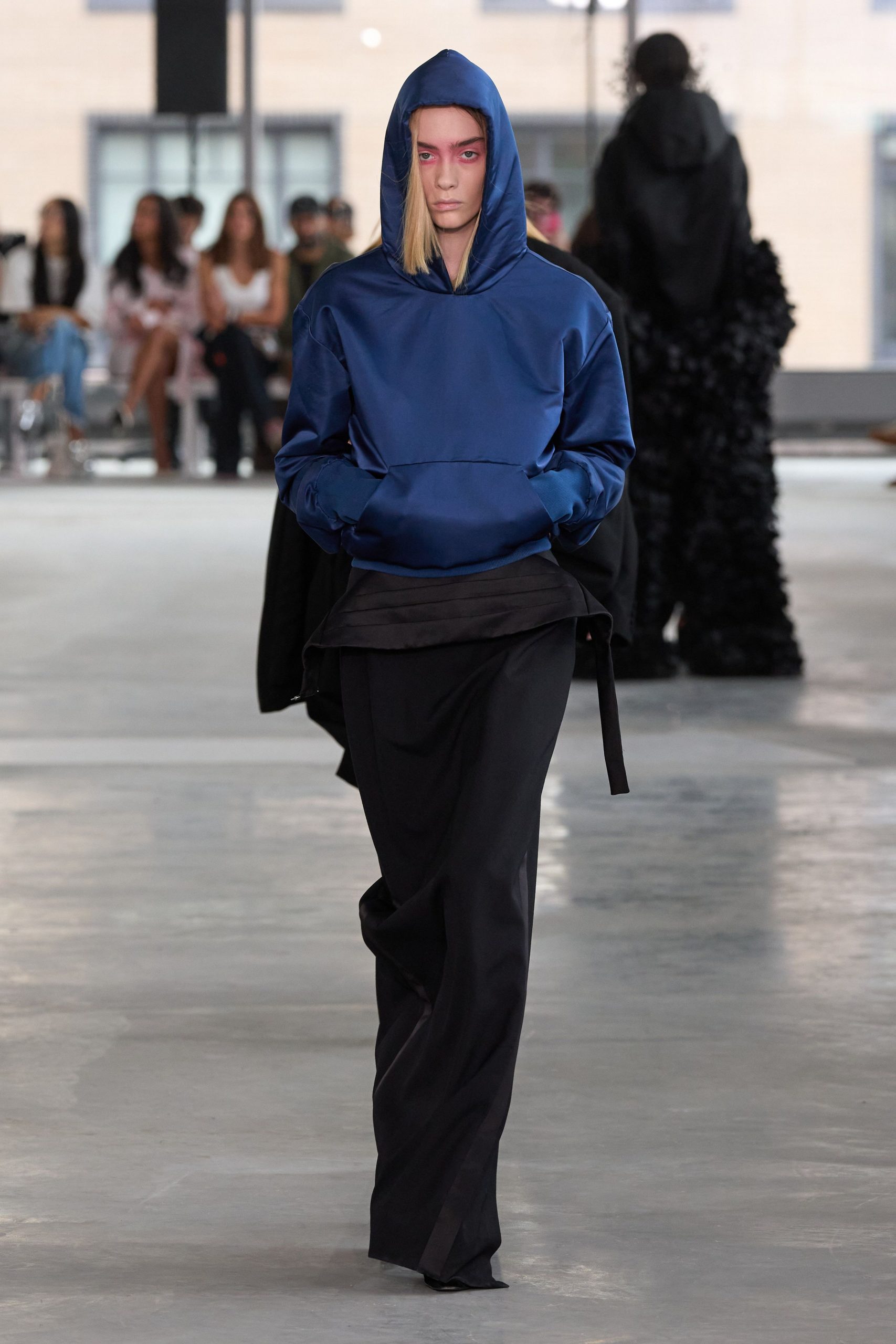 blue silk hoodie and black pants