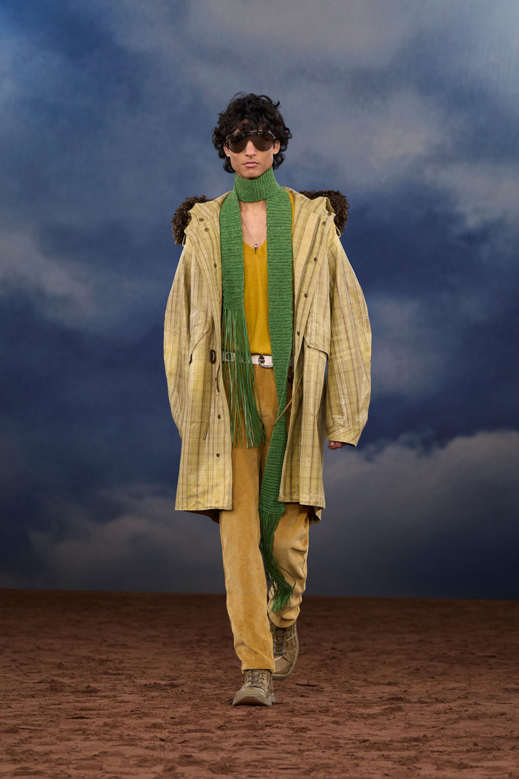 beige coat with yellow top