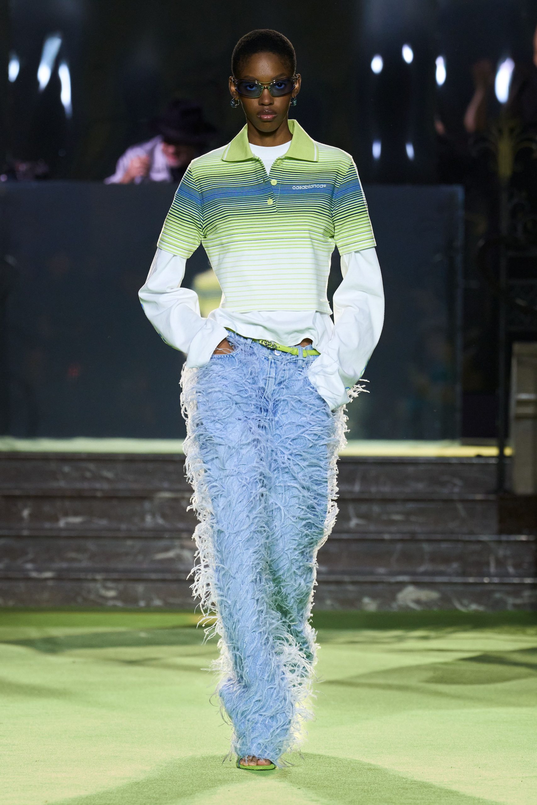green striped shirt with fringed pants