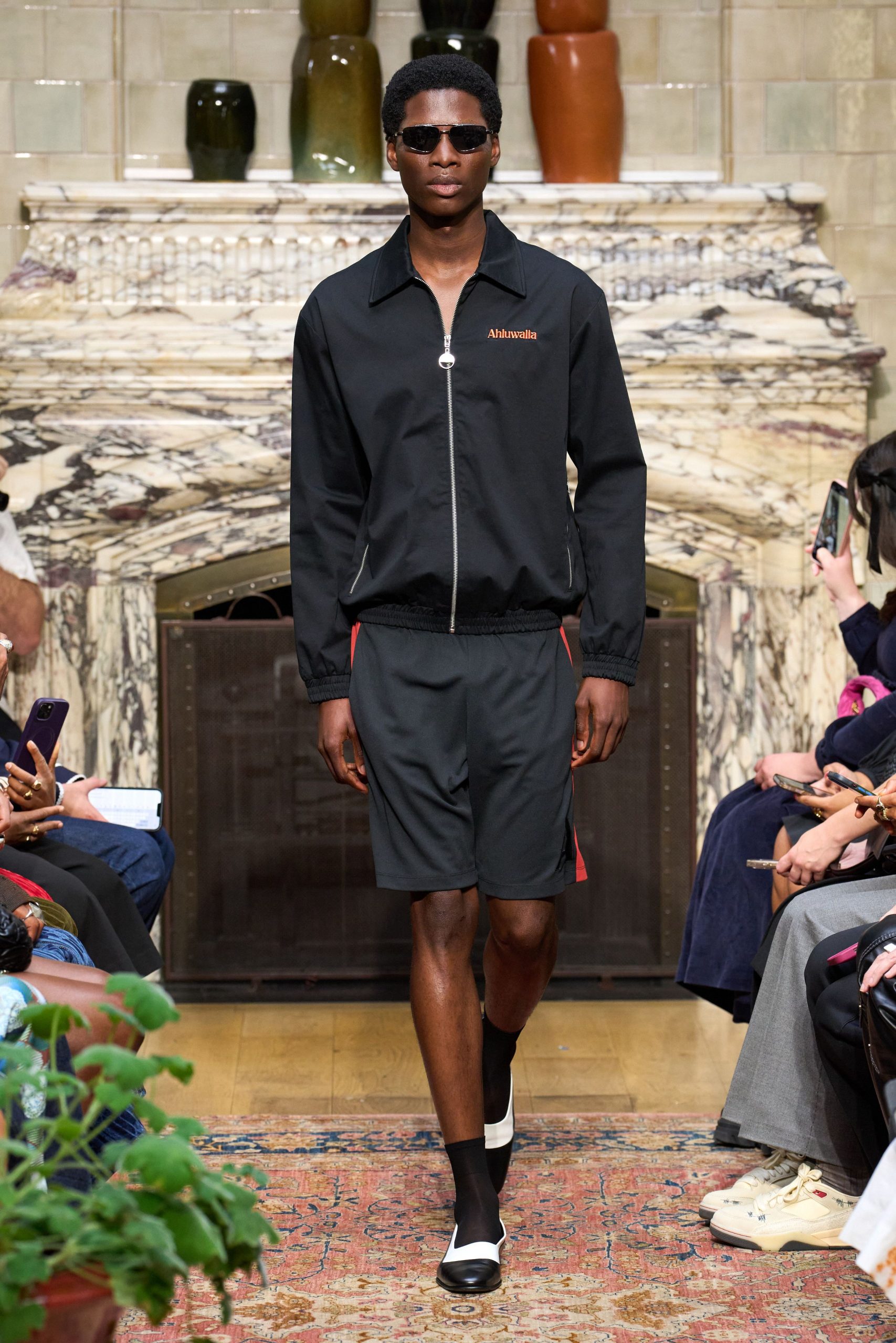 black fitted jacket and shorts