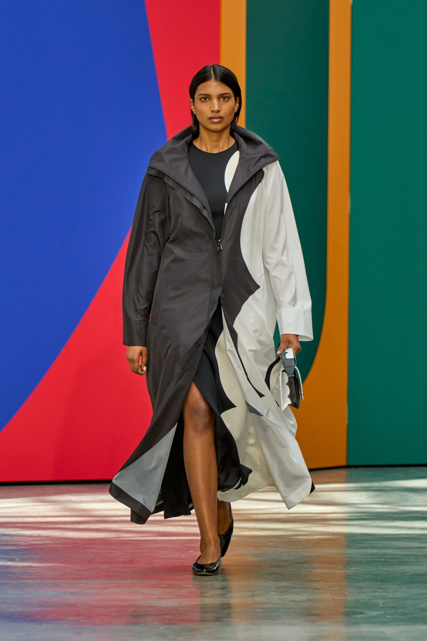 black and white coat over black dress