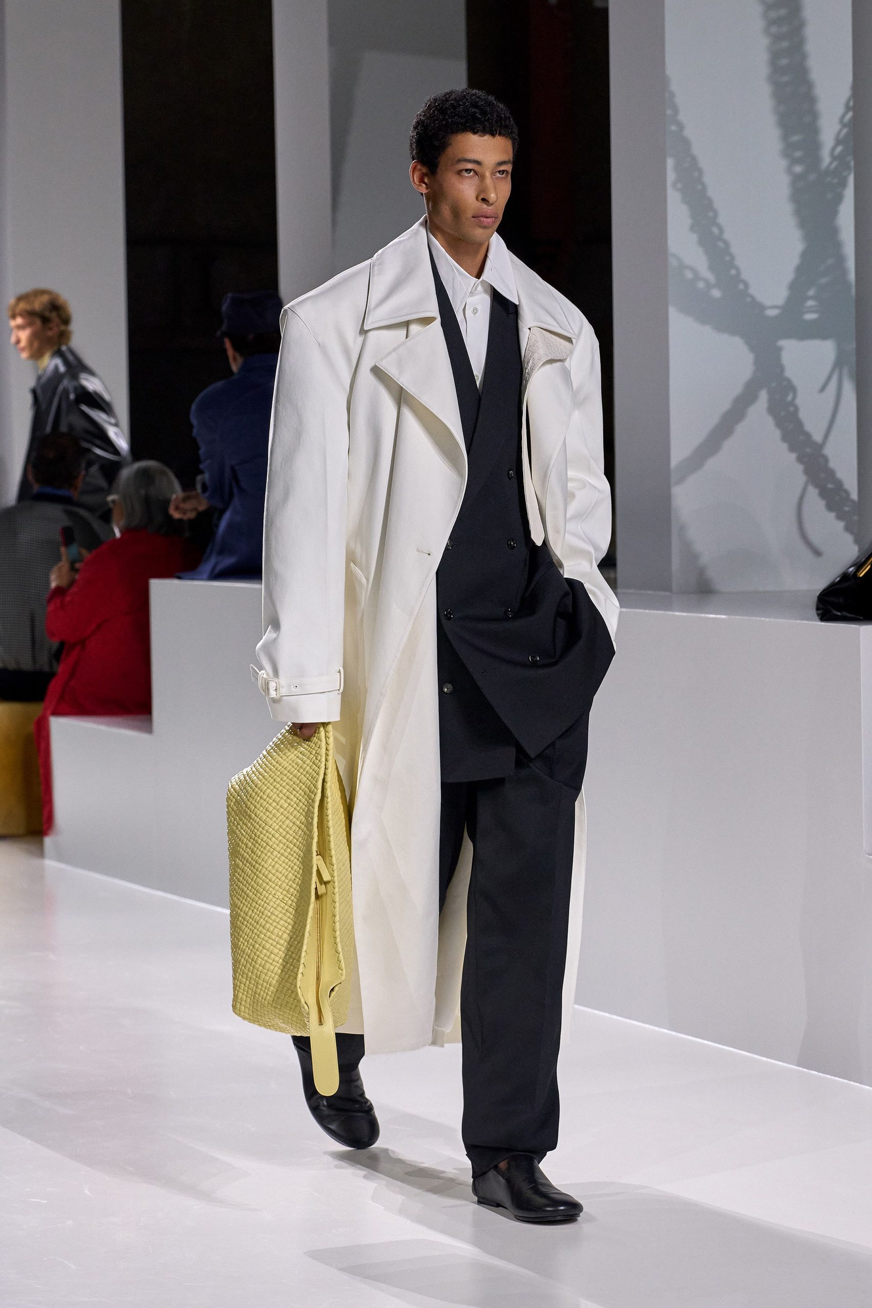 oversized white coat with tailored suit