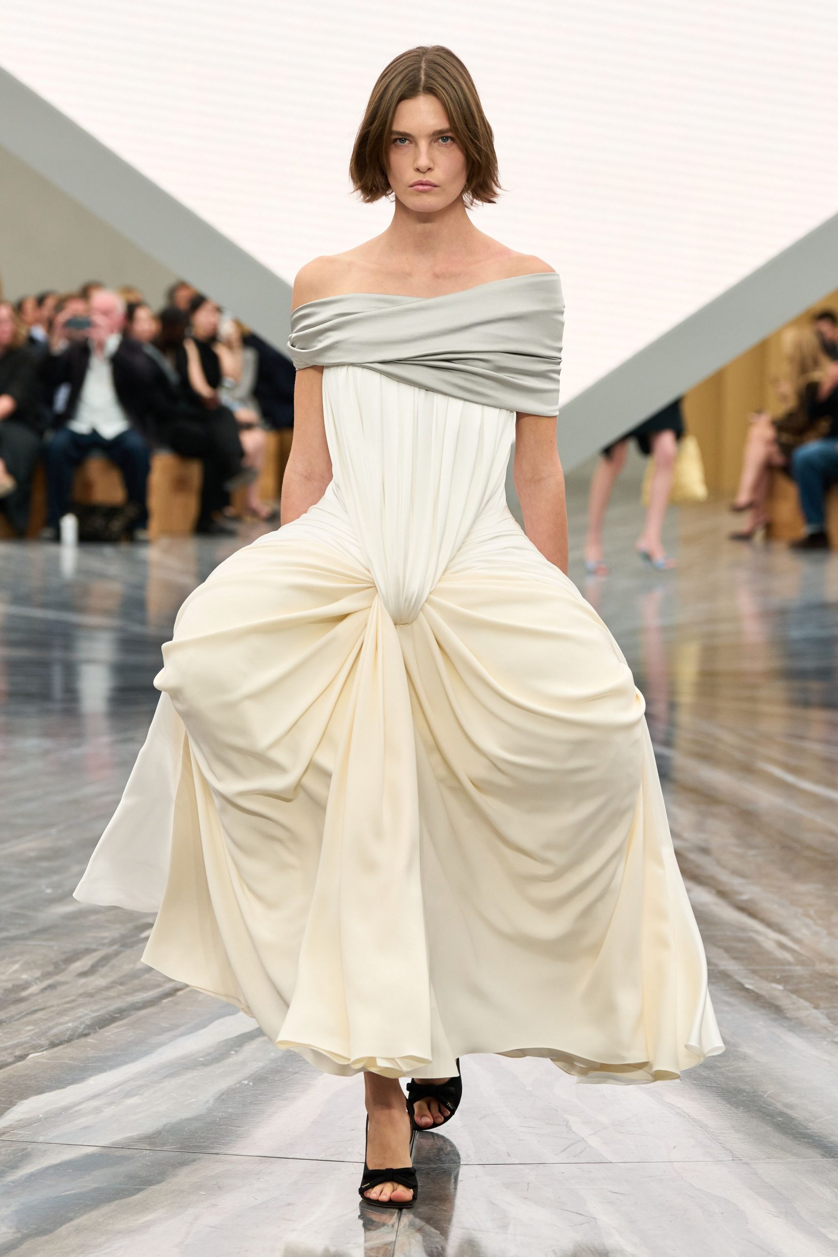 white silk off-shoulder fitted pleated flowing midi gown