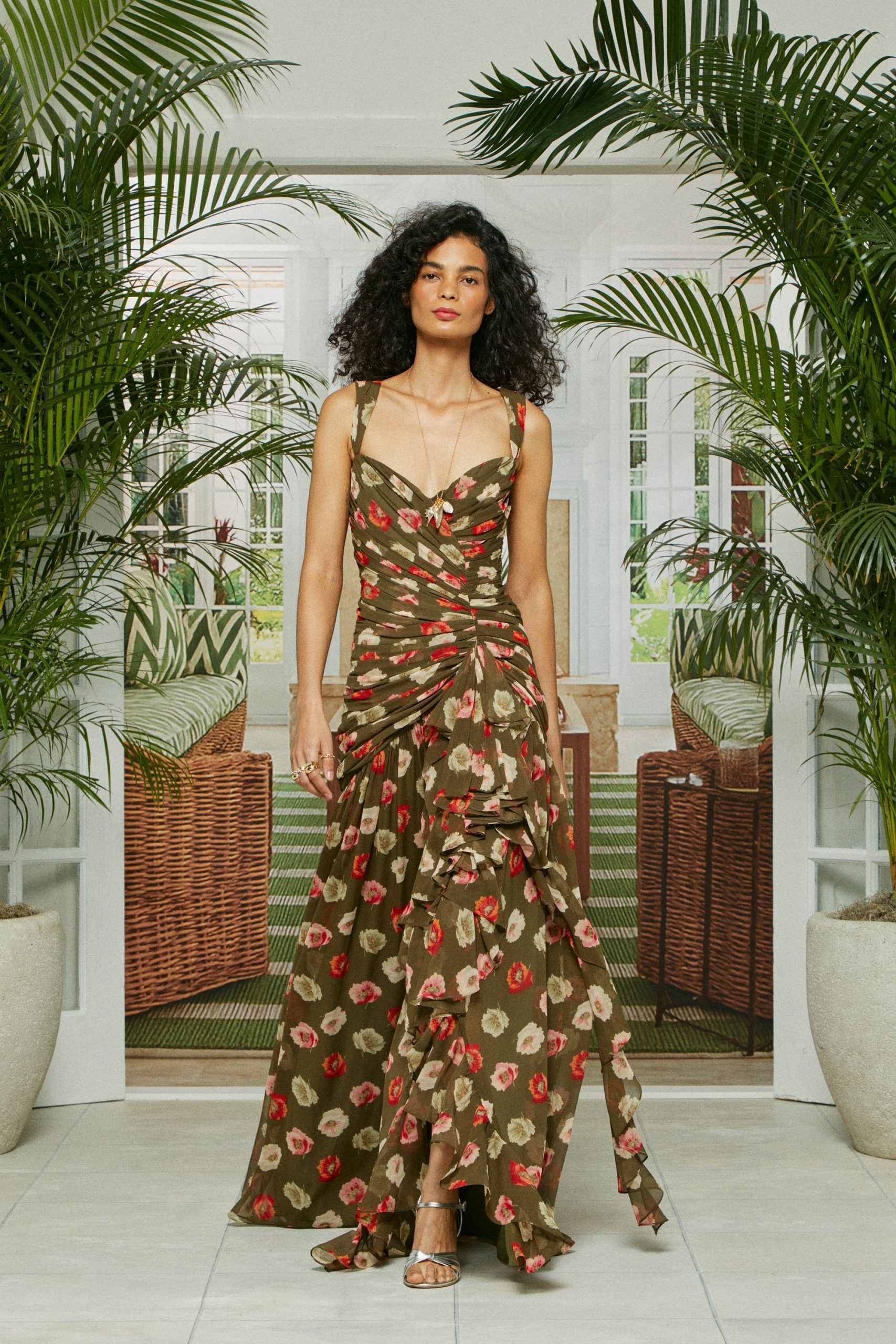 green floral maxi gown with silver shoes