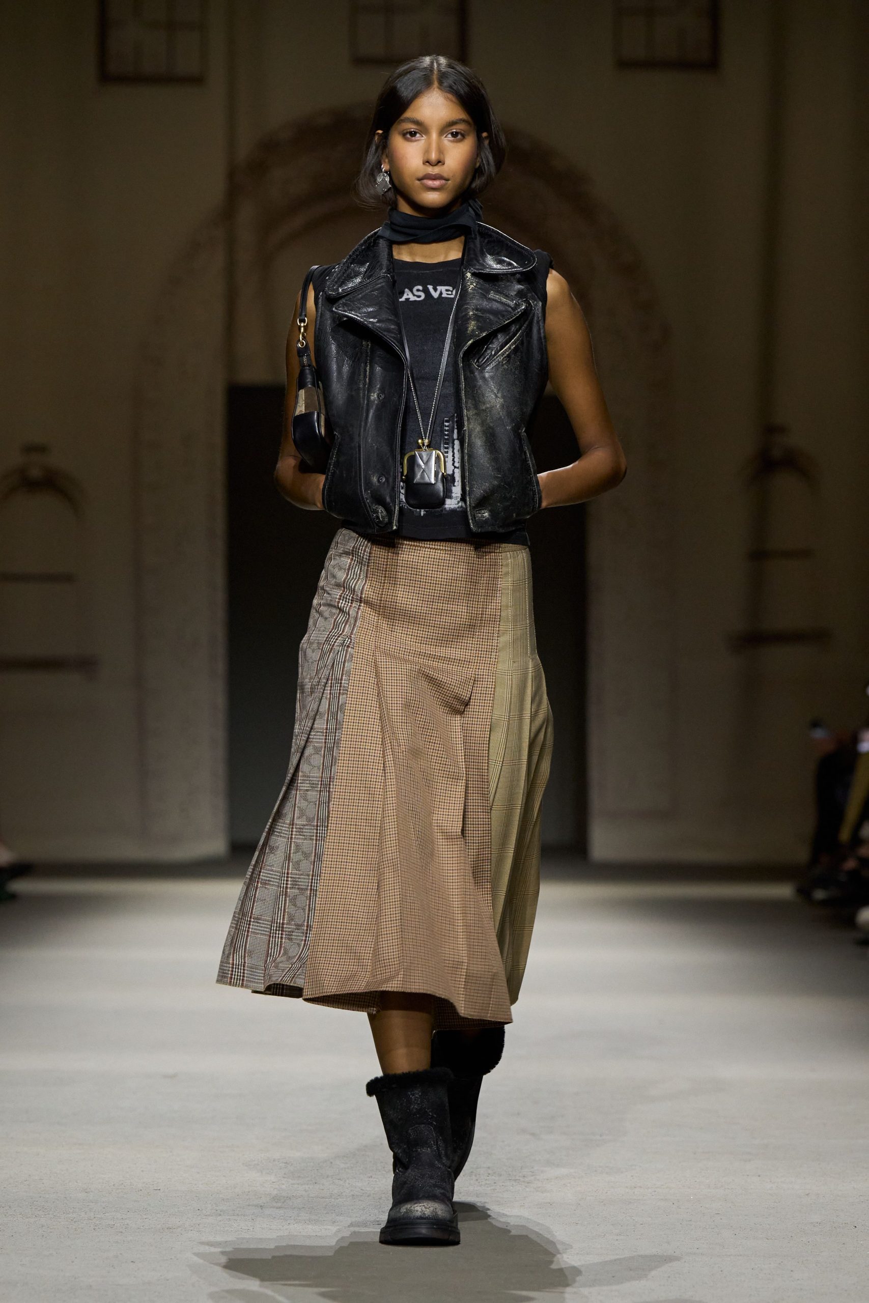 black leather vest with midi skirt