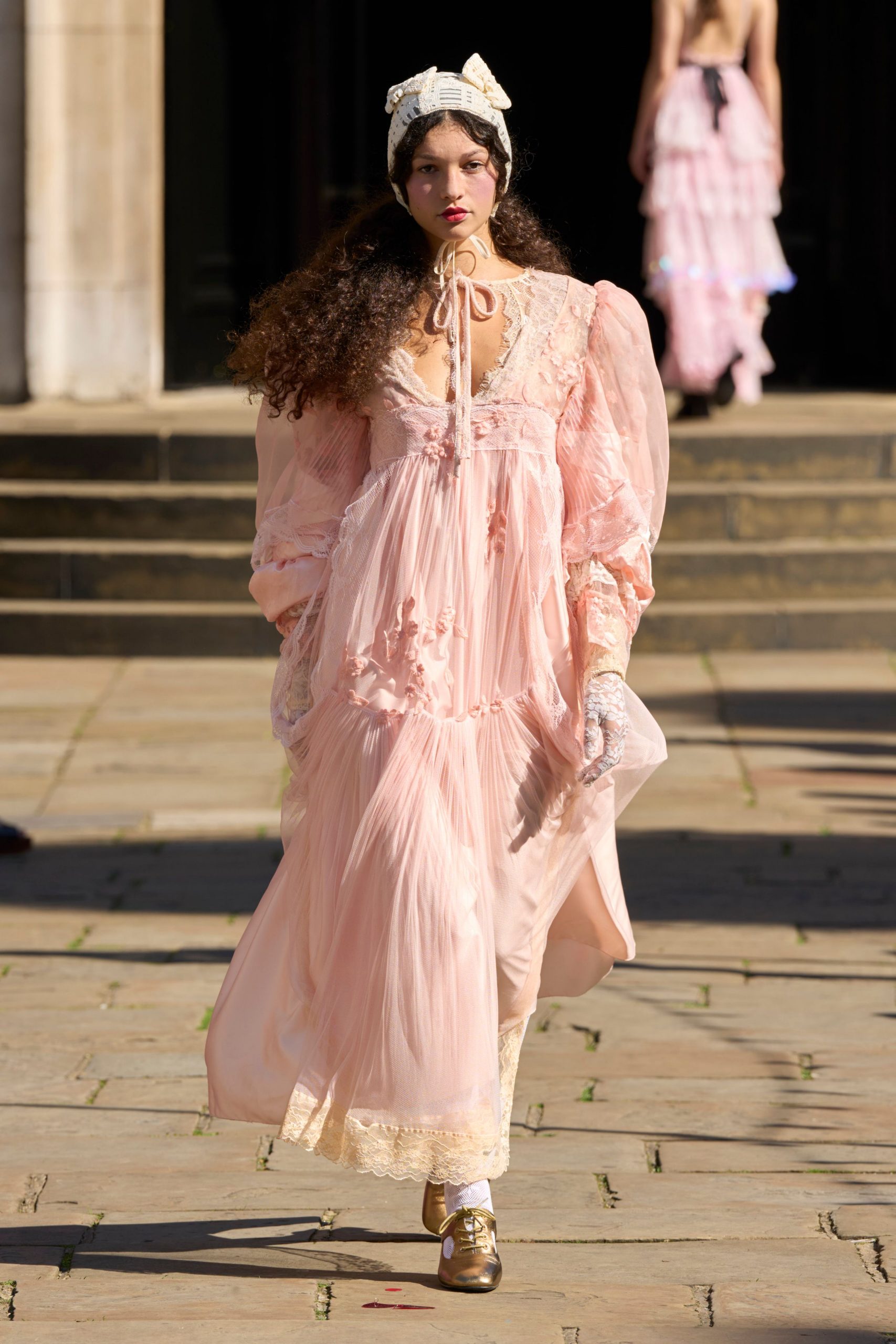 pink silk long-sleeve v-neck relaxed ruffled layered gown