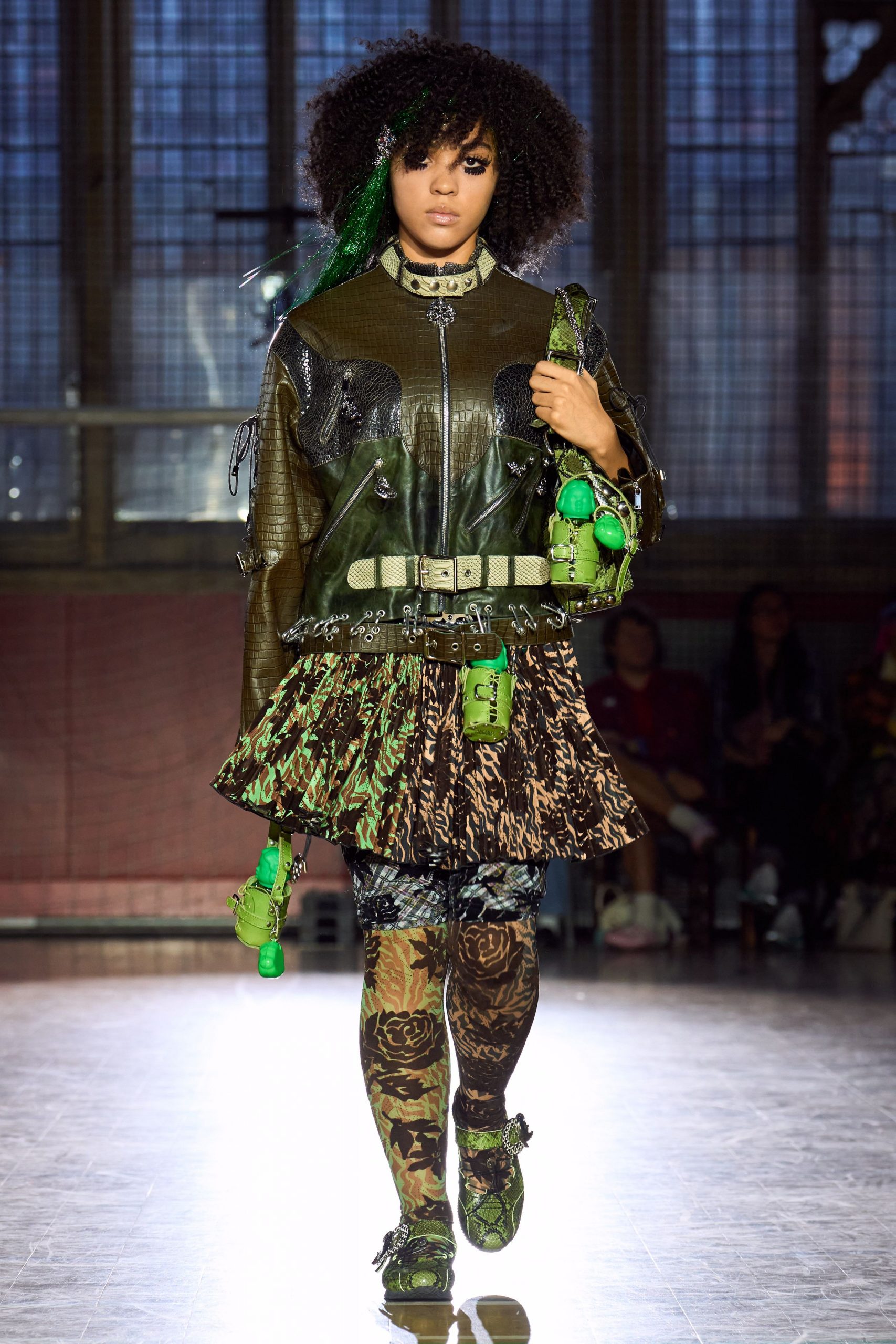 black leather jacket with green accents