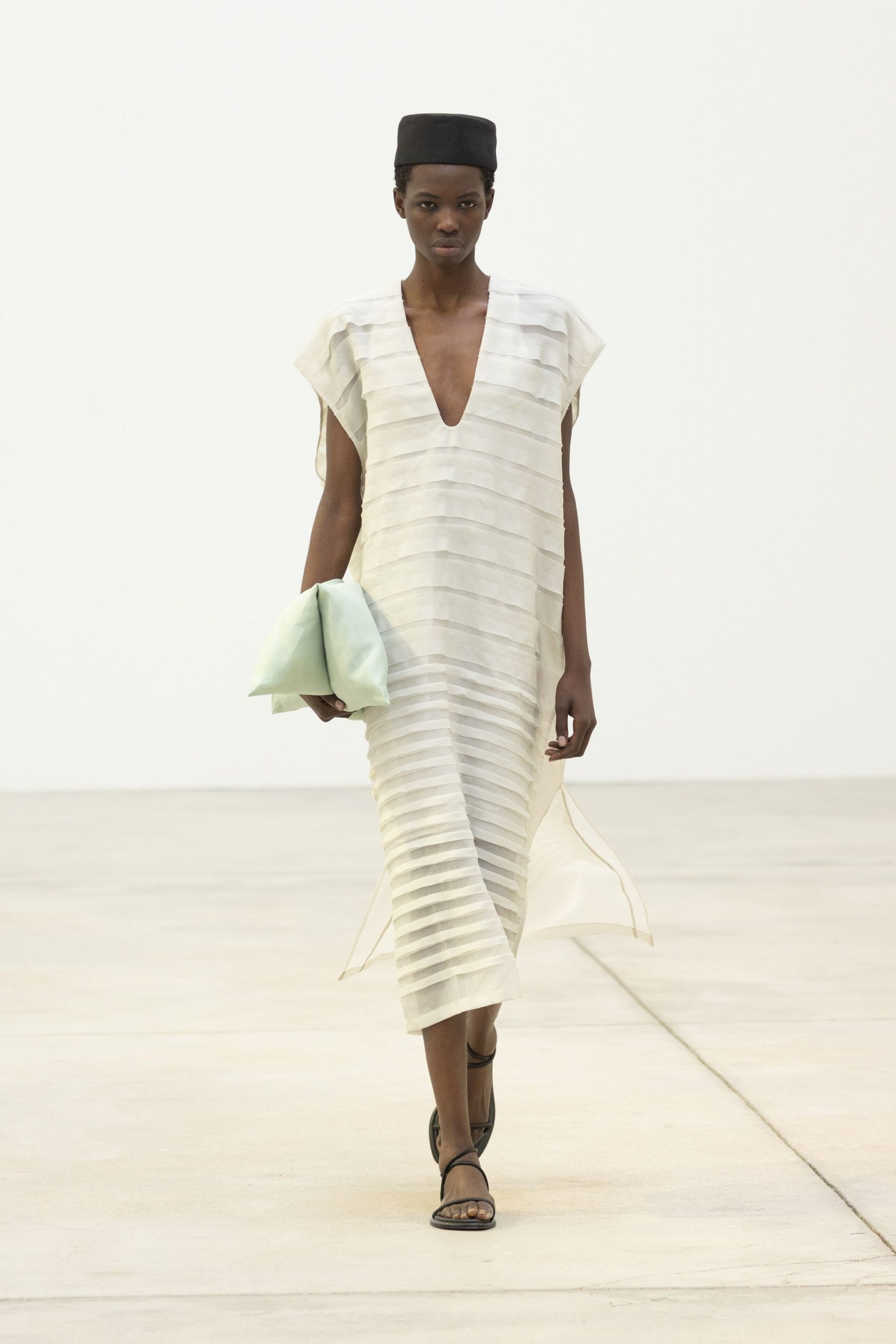 white pleated midi dress