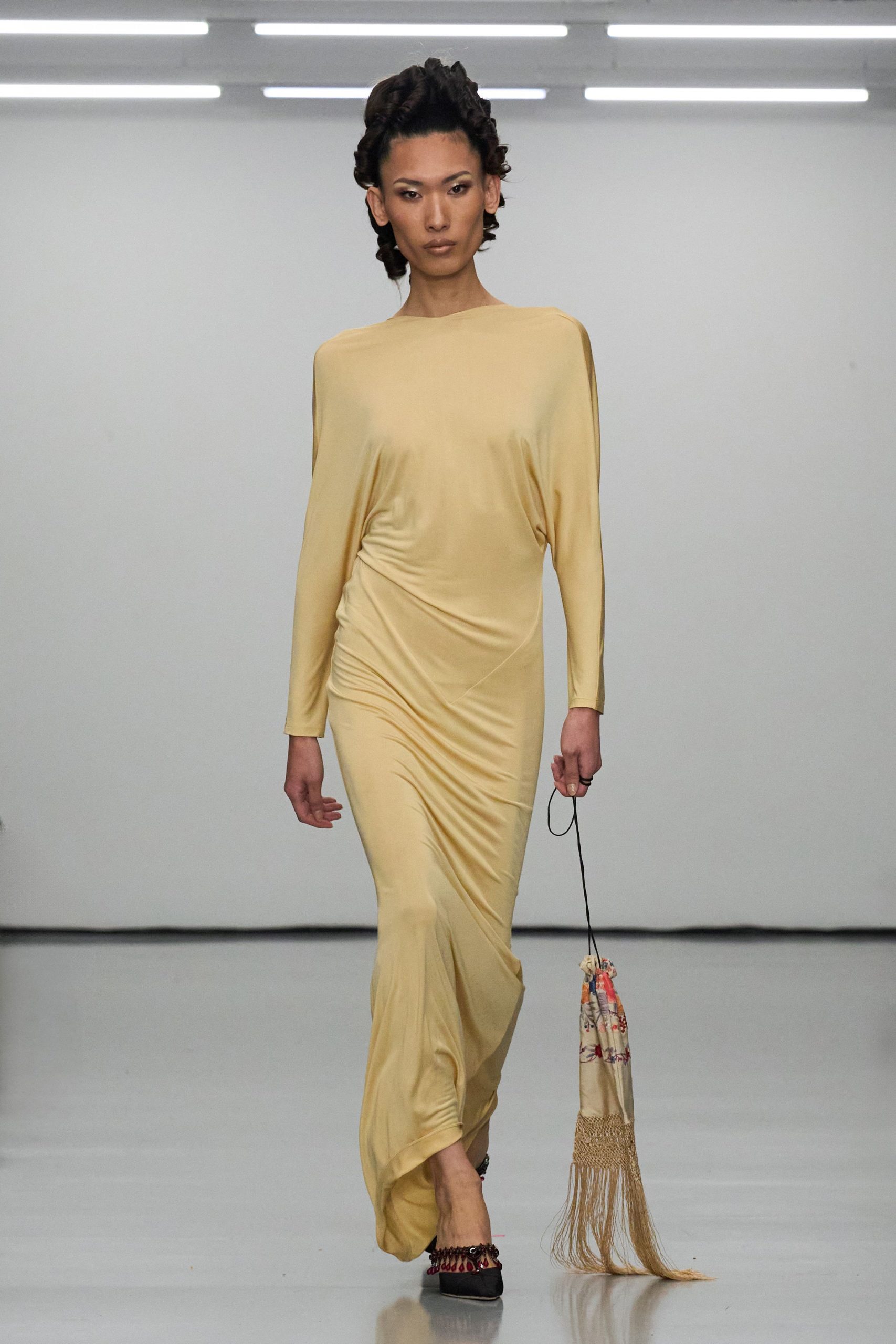 yellow silk long-sleeve gown