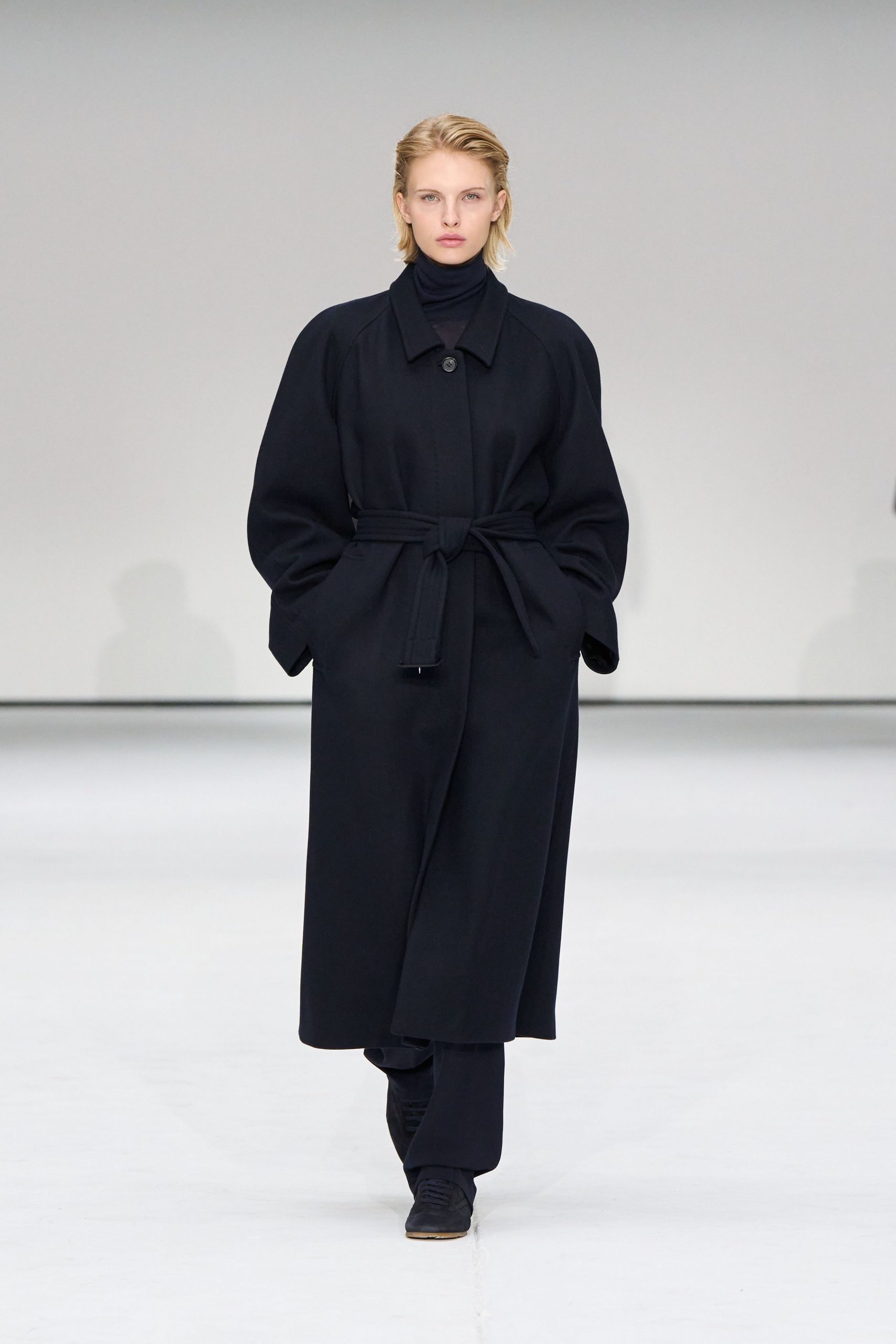 black wool long-sleeve collared oversized belted coat
