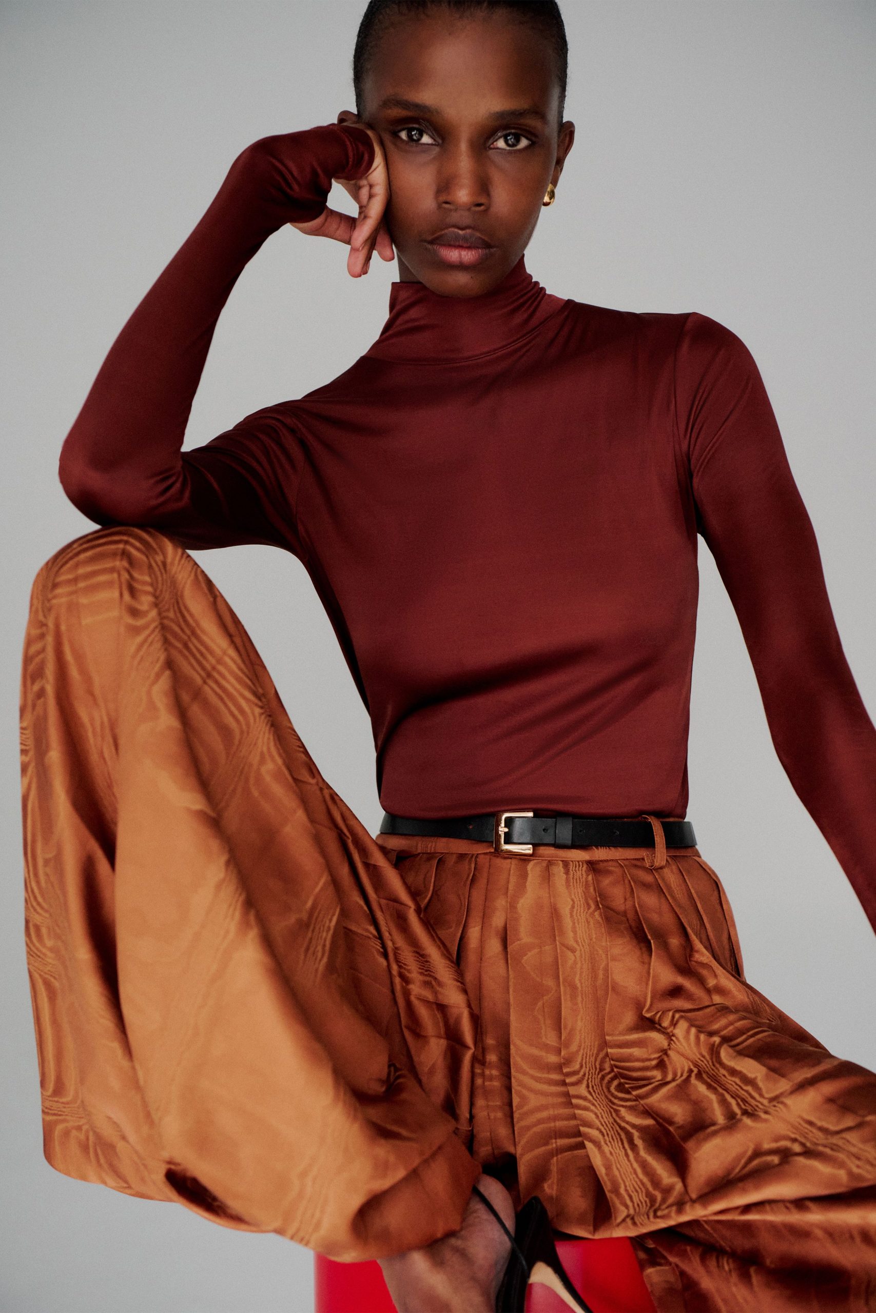 brown silk long-sleeve high-neck fitted textured top