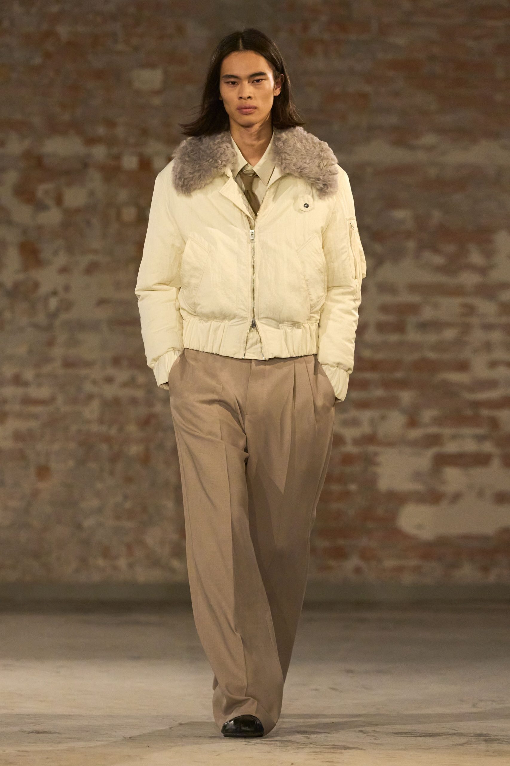 white fitted jacket beige relaxed pants