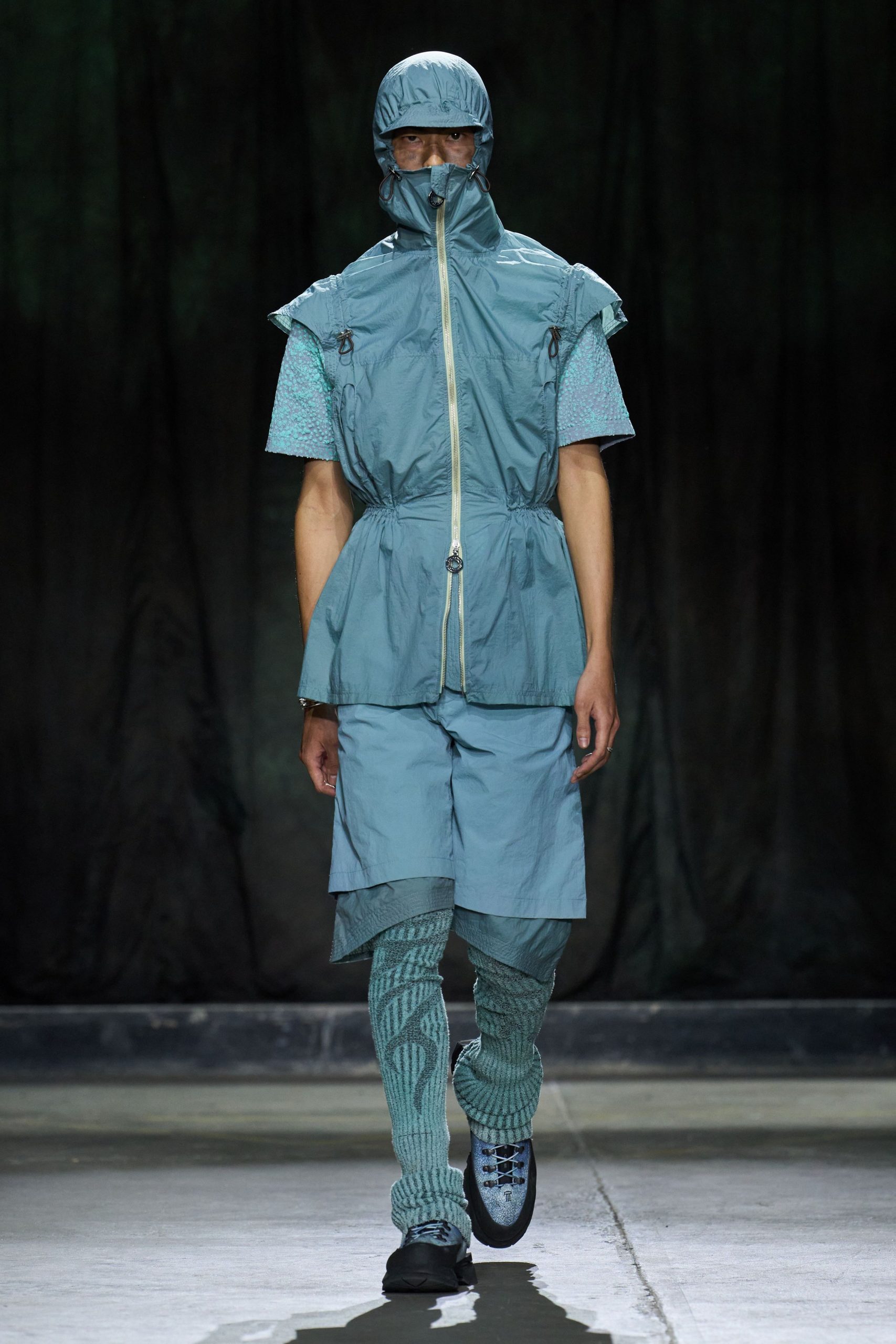 teal jacket with shorts and leggings